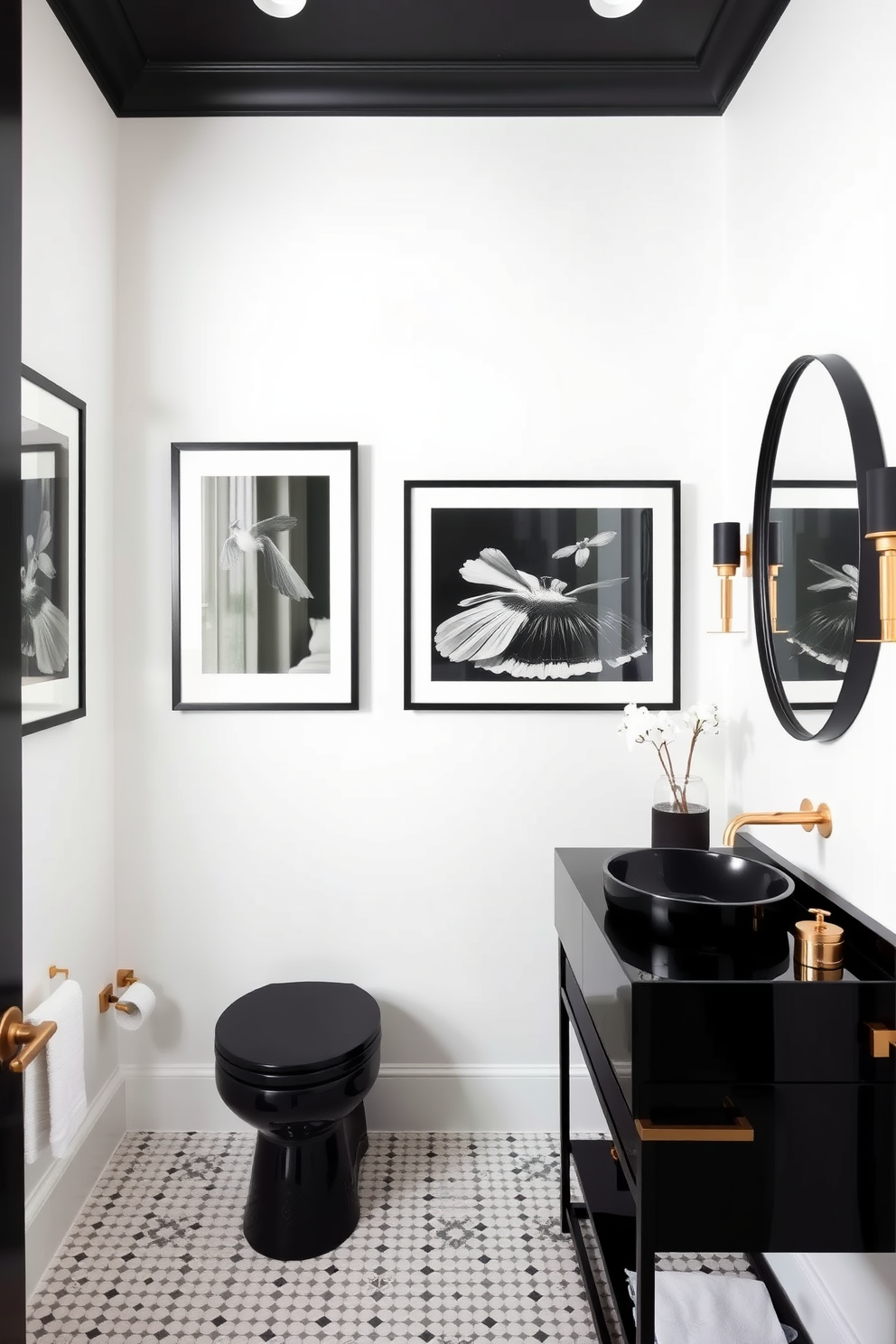 A stylish black powder room featuring black framed art displayed against pristine white walls. The space includes a sleek black vanity with a modern sink and elegant gold fixtures.