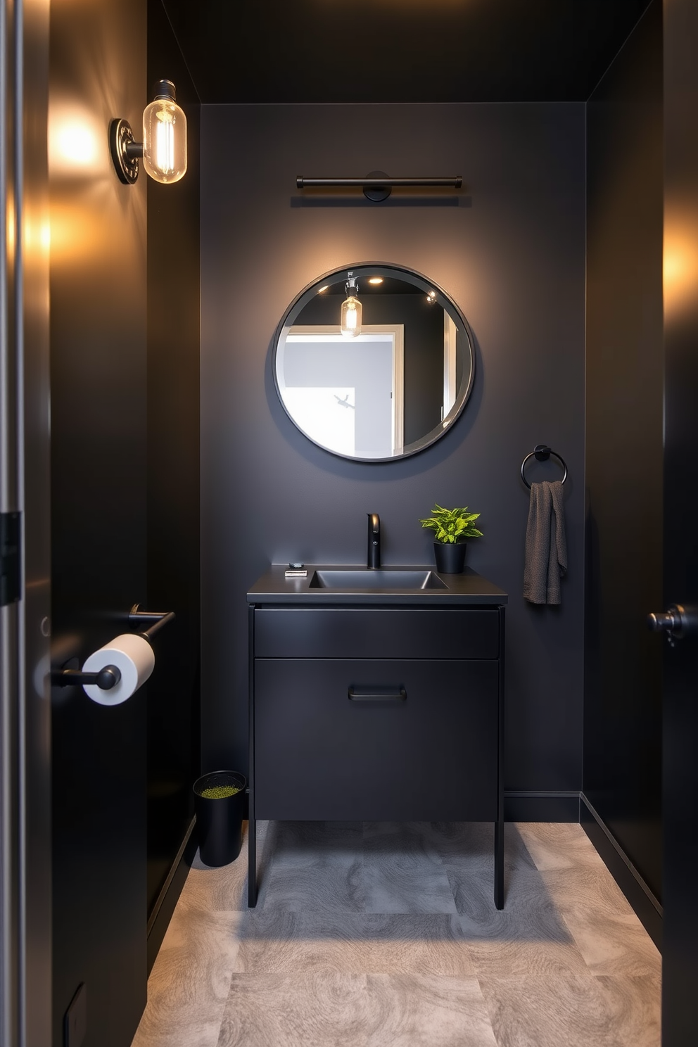 A modern powder room featuring industrial black lighting that creates an urban vibe. The walls are painted in a deep charcoal color, complemented by sleek black fixtures and a minimalist black vanity. A large round mirror with an exposed bulb frame hangs above the vanity, enhancing the room's contemporary aesthetic. The floor is adorned with a textured concrete finish, and a small potted plant adds a touch of greenery to the space.