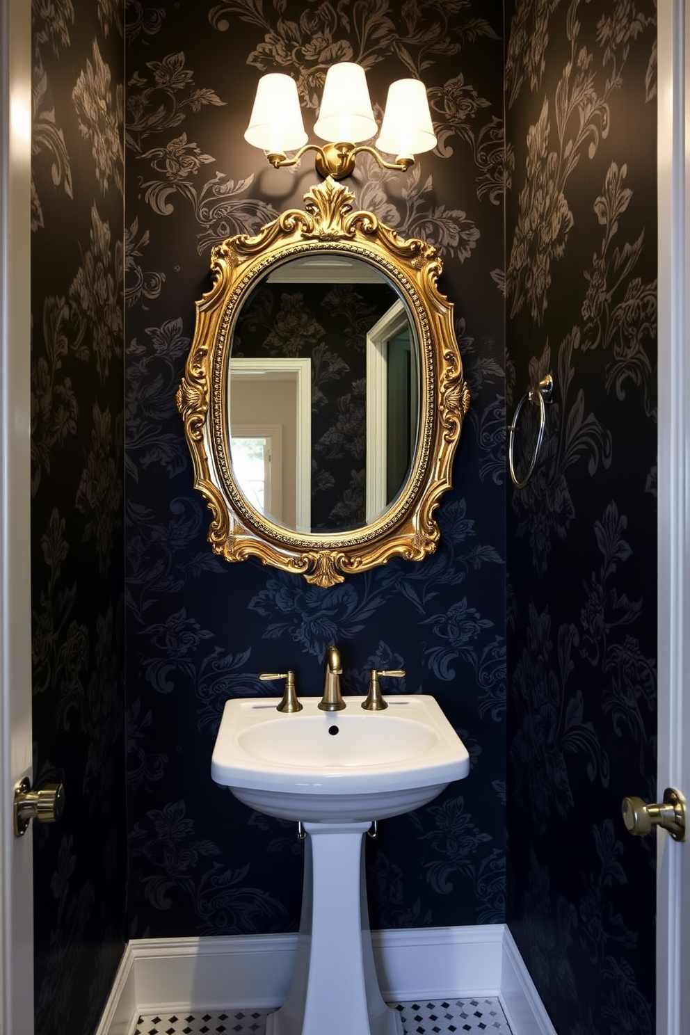 A striking black powder room featuring bold black wallpaper adorned with intricate floral patterns creates a dramatic yet elegant atmosphere. The space is complemented by a sleek white pedestal sink and a vintage gold-framed mirror that adds a touch of sophistication.