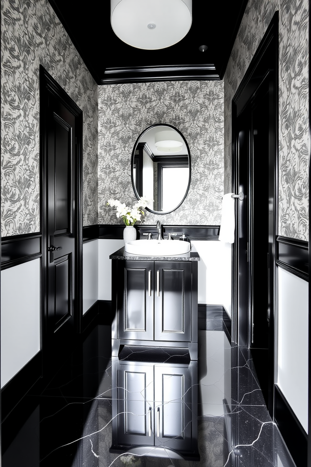 A stylish black powder room featuring a mirrored vanity with sleek black cabinetry. The walls are adorned with elegant wallpaper in a subtle pattern, and the floor showcases a glossy black tile that reflects the room's sophistication.