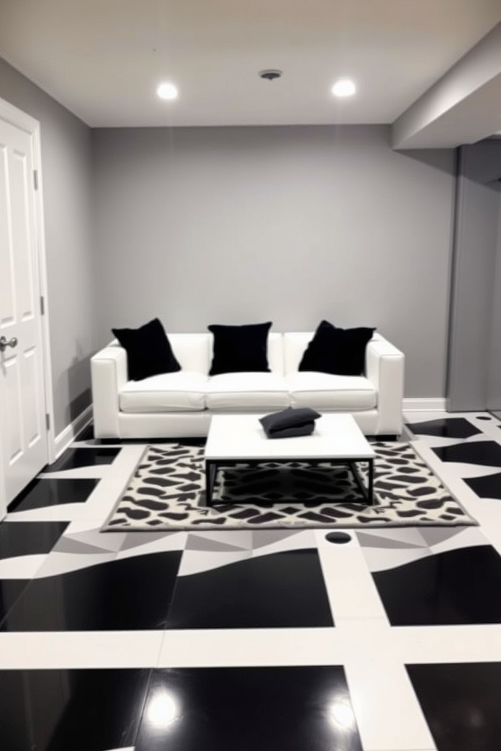 A chic basement space featuring stylish black and white floor tiles that create a striking contrast. The walls are painted in a soft gray, providing a modern backdrop for the bold flooring. In one corner, a cozy seating area is arranged with a plush white sofa and black accent pillows. A sleek coffee table sits in front, complemented by a geometric area rug that ties the design together.