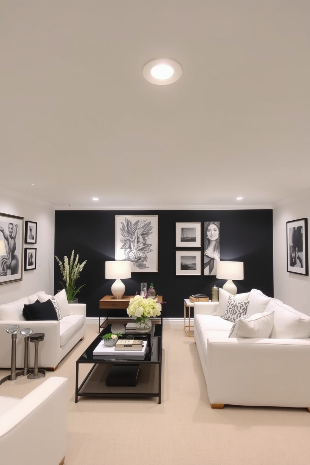 A bold black accent wall serves as the focal point of the basement, creating a dramatic backdrop for the space. Complementing the wall are carefully curated pieces of art that add character and depth to the room. The overall design features a monochromatic color scheme with white furnishings and decor elements. Sleek furniture pieces are arranged to maximize both comfort and functionality, making the basement an inviting retreat.