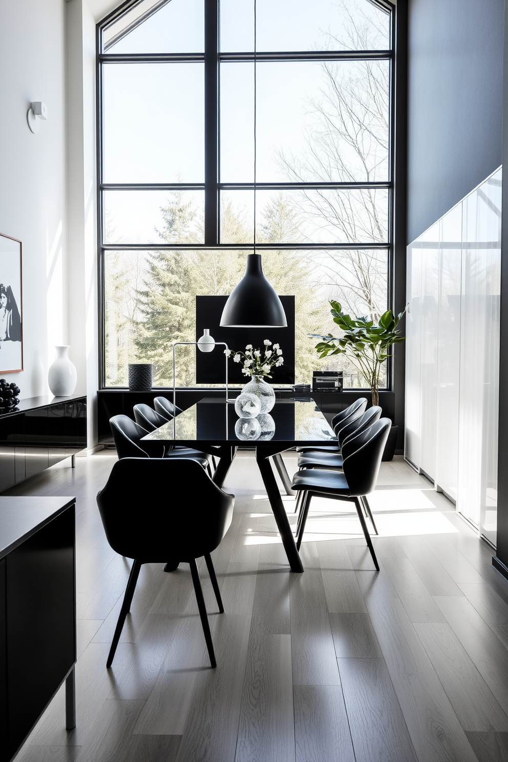 A mid-century modern dining room features sleek black dining furniture that exudes elegance and simplicity. The space is enhanced by a striking contrast of black and white elements, creating a timeless and sophisticated atmosphere. The dining table, with its clean lines and minimalist design, is surrounded by comfortable black chairs that invite gatherings. Large windows allow natural light to flood the room, illuminating the stylish decor and enhancing the monochromatic theme.