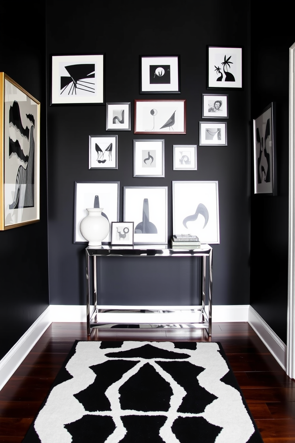 A dramatic black wall serves as a striking backdrop, adorned with an eclectic collection of black and white artwork in sleek frames. The foyer features a minimalist console table with a glossy finish, complemented by a bold geometric rug that adds texture and contrast to the space.