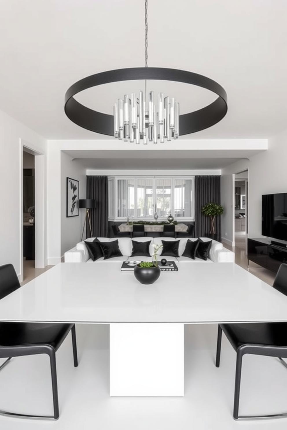 A statement black chandelier hangs elegantly over a sleek white dining table, creating a striking contrast that draws the eye. Surrounding the table, modern black chairs with clean lines enhance the sophisticated atmosphere of the dining space. The living room features a harmonious blend of black and white elements, showcasing a plush white sofa paired with bold black accent pillows. A minimalist coffee table sits at the center, complemented by a stylish area rug that ties the monochromatic theme together.