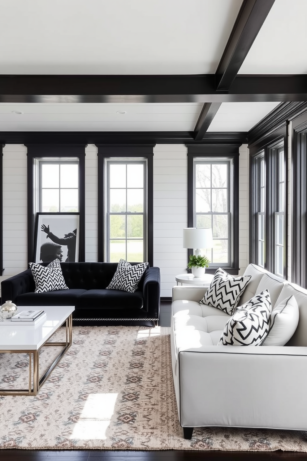 A classic white shiplap wall design features elegant black trim that accentuates the clean lines and adds depth to the space. The room is furnished with a plush black sofa and a stylish white coffee table, creating a striking contrast that embodies modern sophistication. Incorporate black and white patterned throw pillows and a chic area rug to enhance the monochrome aesthetic. Large windows allow natural light to flood the room, highlighting the harmonious blend of classic and contemporary elements.