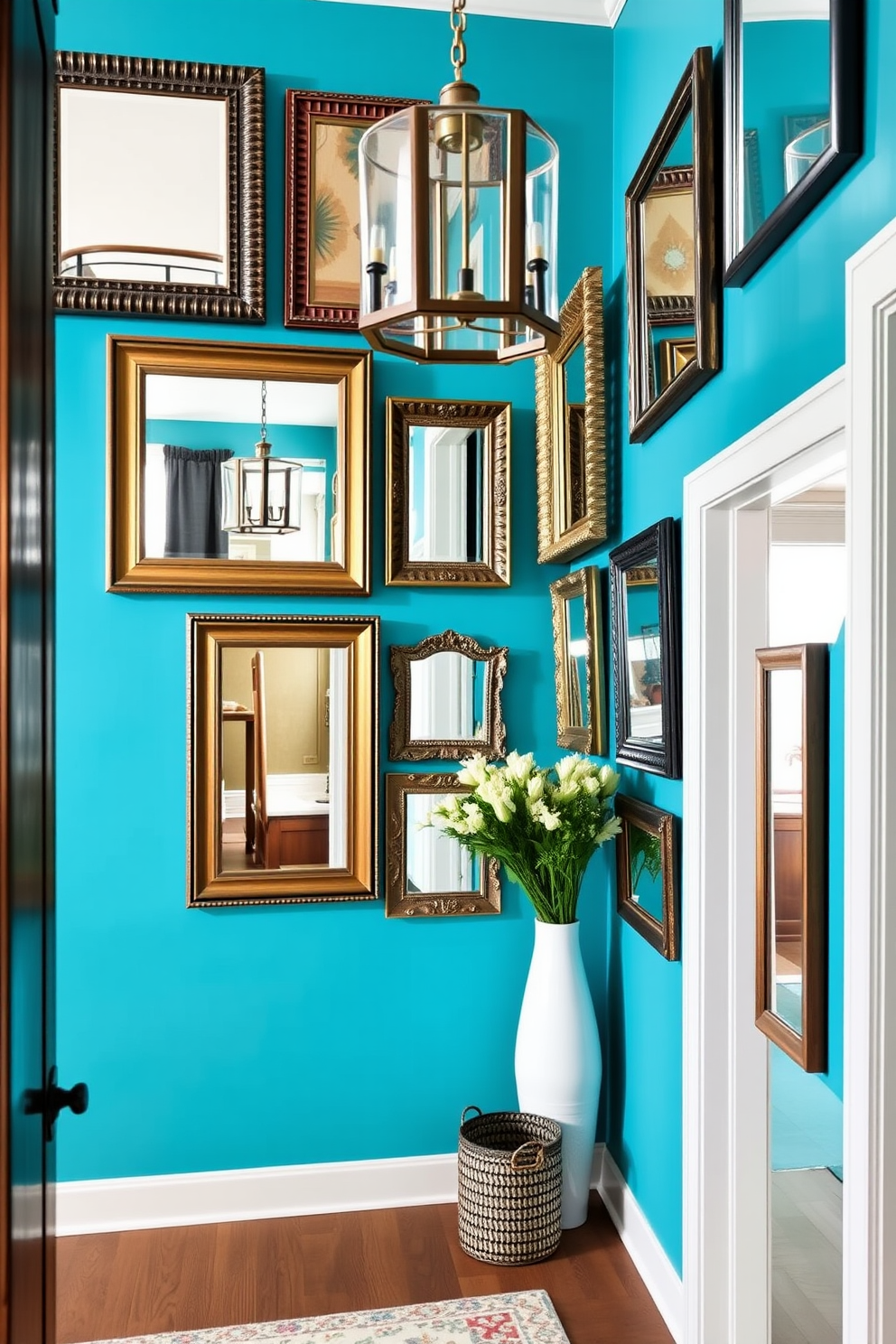 A striking foyer features a vibrant turquoise accent wall that adds a pop of color to the space. Framed mirrors of various sizes are artfully arranged to reflect light and create an inviting atmosphere.