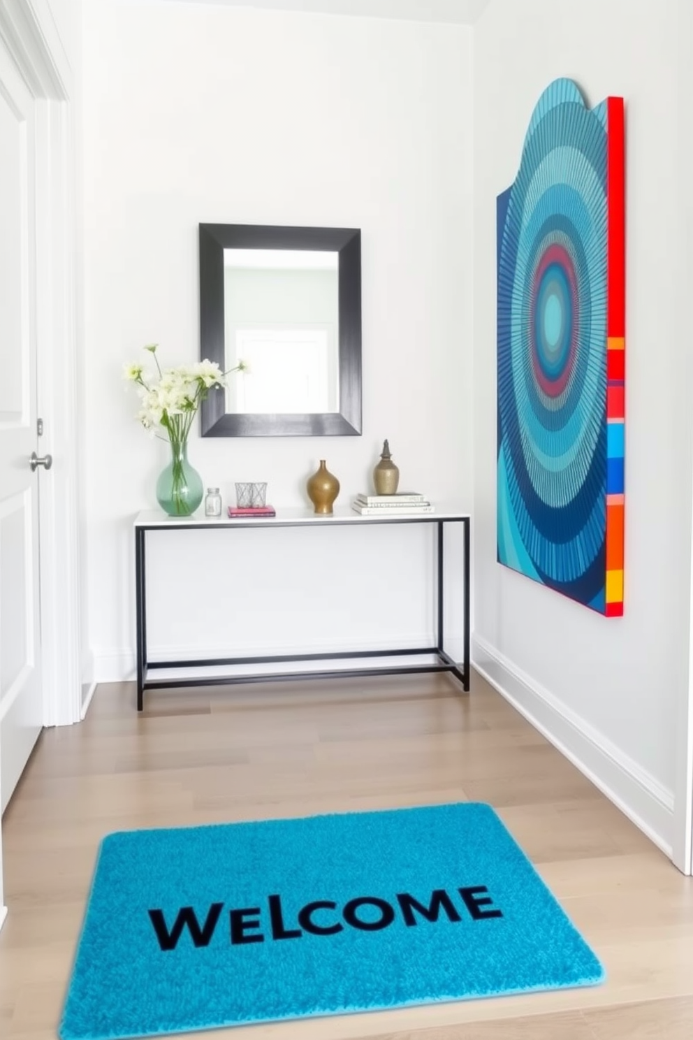 A bright blue welcome mat greets visitors at the entrance, adding a pop of color to the space. The foyer features a sleek console table against the wall, adorned with decorative items and a stylish mirror above it. The walls are painted in a soft white hue, creating a fresh and airy atmosphere. A vibrant piece of artwork hangs on one side, complementing the blue mat and enhancing the overall design.