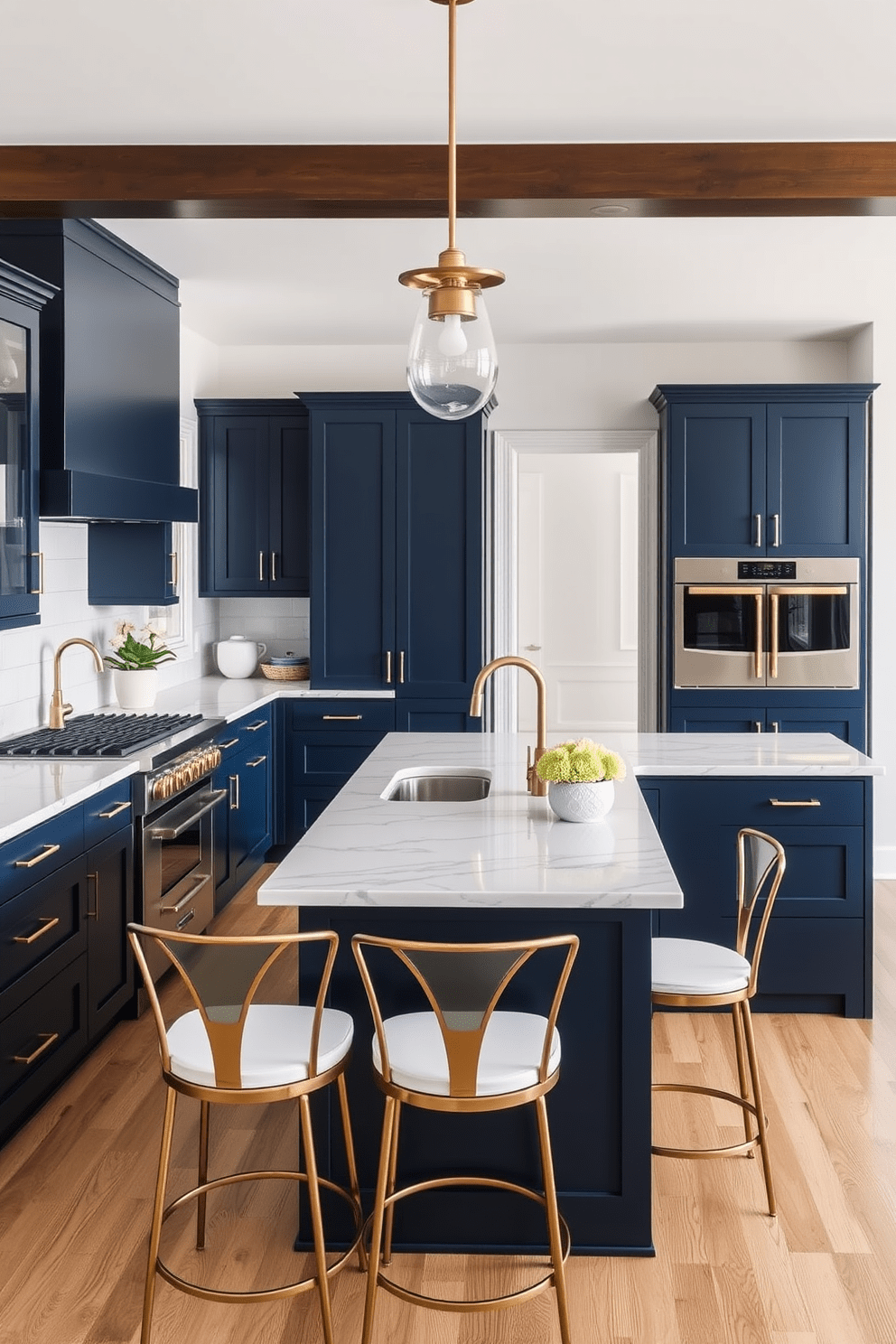 A modern kitchen featuring dark blue cabinets with sleek gold fixtures. The countertops are a light marble, providing a striking contrast to the deep colors of the cabinetry. A spacious island in the center is adorned with stylish bar stools, creating an inviting space for gatherings. Bright pendant lights hang above the island, illuminating the kitchen with a warm glow.