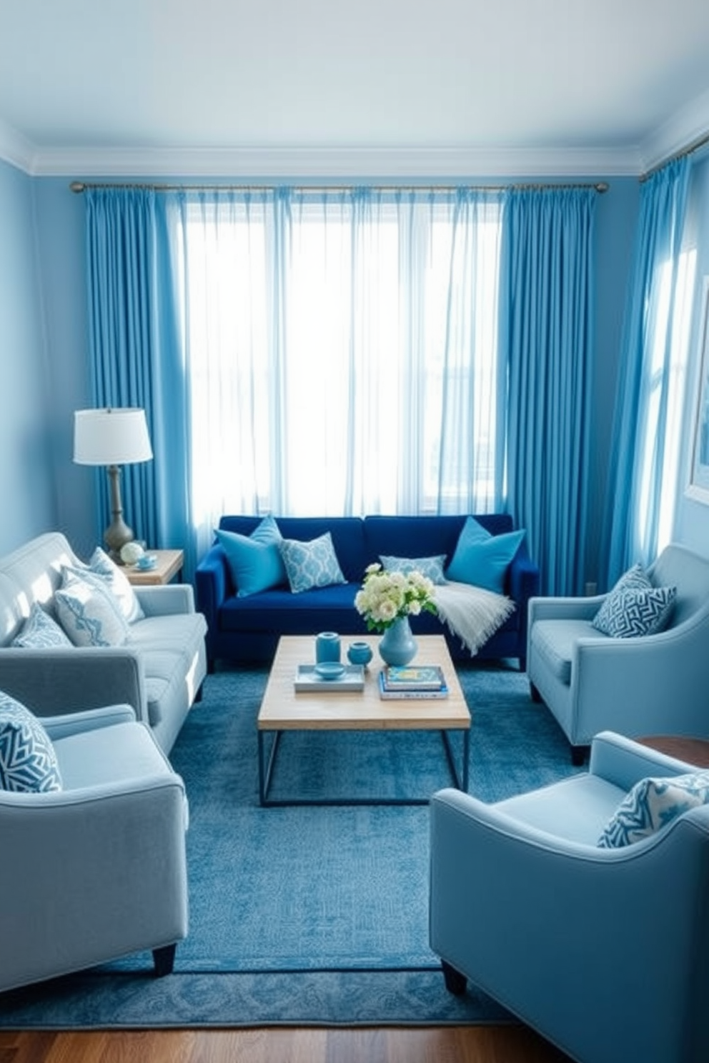 A serene blue living room featuring varying shades of blue throughout the space. The walls are painted in a soft sky blue while the furniture includes a deep navy sofa paired with light blue accent chairs. A large area rug in a muted blue pattern anchors the seating area. Decorative throw pillows in different shades of blue add depth and texture to the sofa. Natural light pours in through sheer blue curtains, enhancing the tranquil atmosphere. A sleek coffee table in a light wood finish sits in the center, complemented by a few blue-toned decorative accessories.