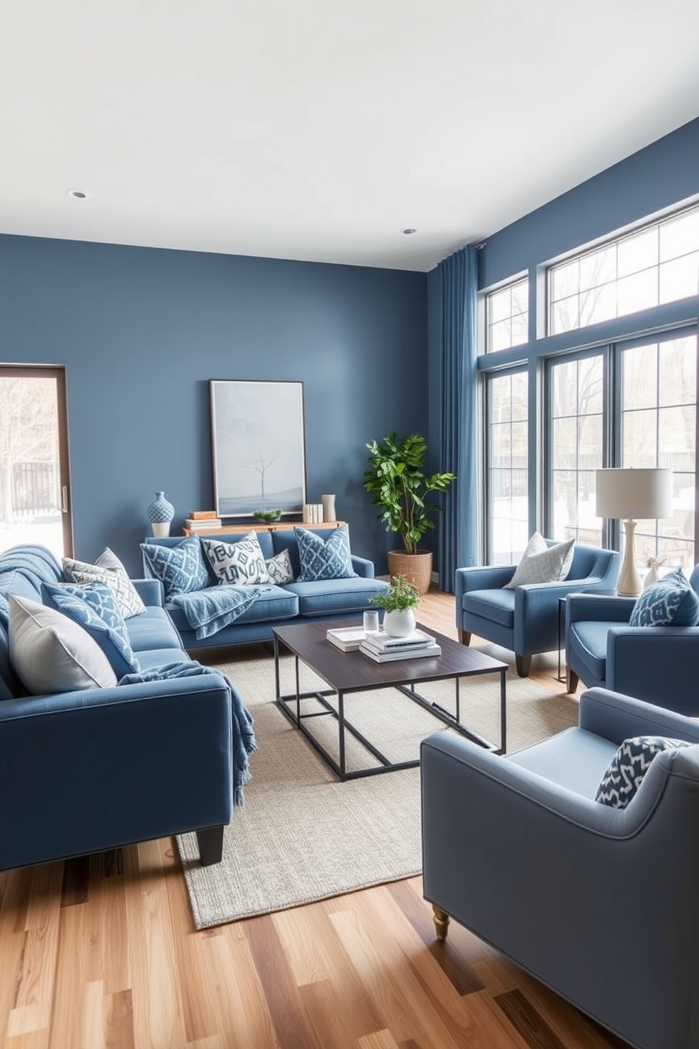 A cozy living room featuring a plush blue sofa adorned with soft blue throw blankets for seasonal warmth. The space is accented with a large area rug in neutral tones, complemented by decorative pillows in varying shades of blue. A modern coffee table sits in the center, surrounded by stylish armchairs that invite relaxation. Large windows allow natural light to flood the room, enhancing the serene blue color palette throughout the design.