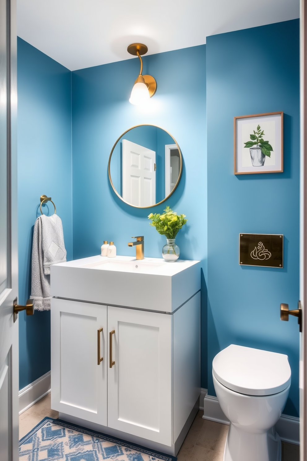 A chic powder room featuring powder blue accents throughout the decor. The walls are painted in a soft powder blue, complemented by sleek white cabinetry and a stylish floating vanity. The space includes a round mirror with a brushed gold frame above the sink. Decorative elements like a patterned rug and fresh greenery add warmth and vibrancy to the modern design.