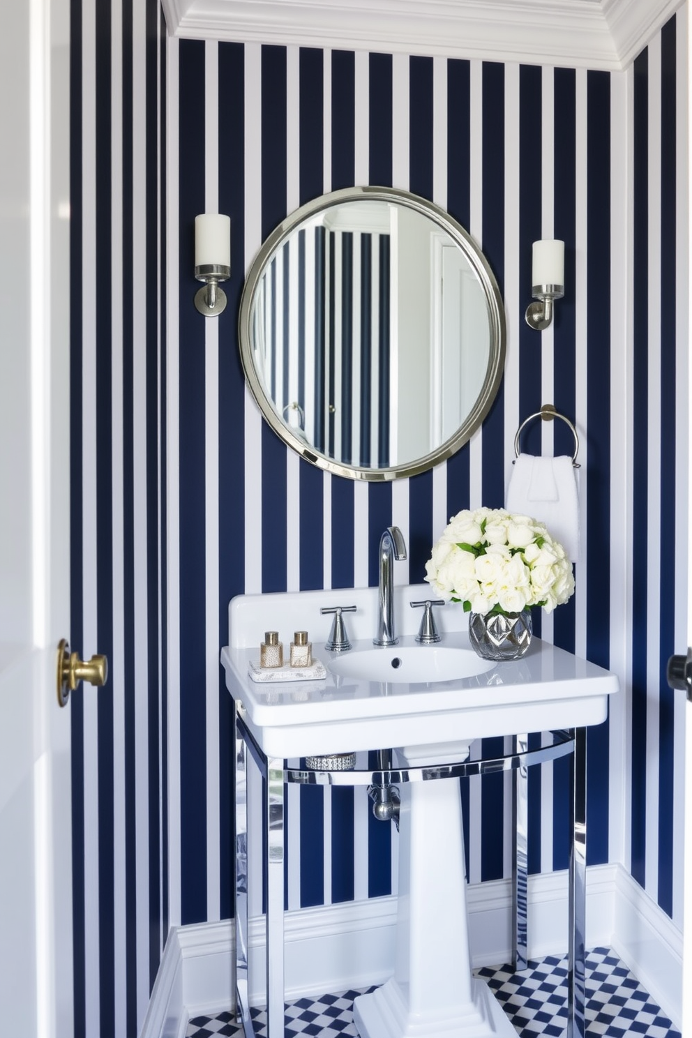 Navy and white striped wallpaper creates a stunning backdrop for this elegant blue powder room. A sleek white pedestal sink is complemented by a round mirror with a polished chrome frame, enhancing the sophisticated aesthetic. The walls are adorned with navy and white striped wallpaper that adds depth and character to the space. A small, stylish console table below the mirror holds decorative accessories and a fresh bouquet of white flowers.