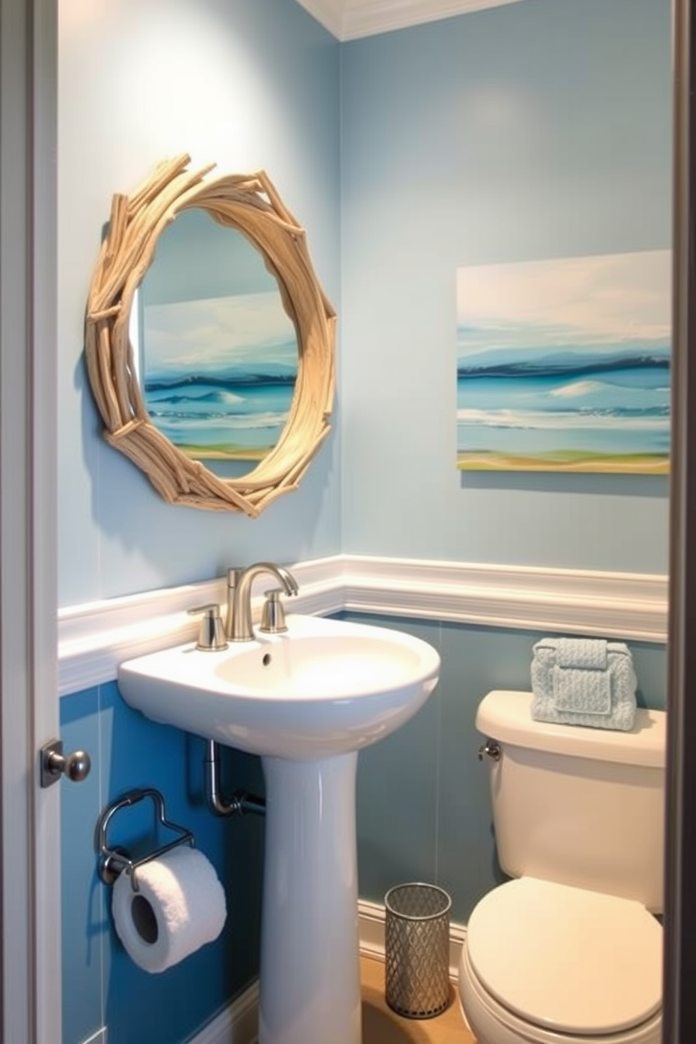 Create an ocean-inspired powder room that features calming shades of blue. The walls are adorned with abstract ocean-themed art that evokes tranquility and serenity. Incorporate a sleek pedestal sink with a brushed nickel faucet. Add a round mirror with a driftwood frame to enhance the coastal aesthetic and reflect natural light.