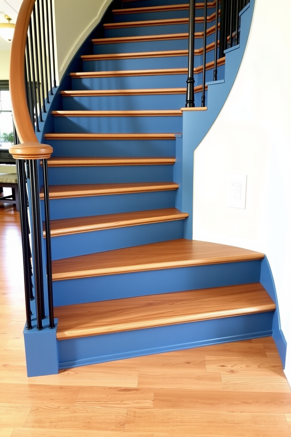 A stunning staircase featuring soft denim blue risers that complement the natural wood steps. The design creates a harmonious blend of colors and textures, adding a touch of elegance to the entryway.