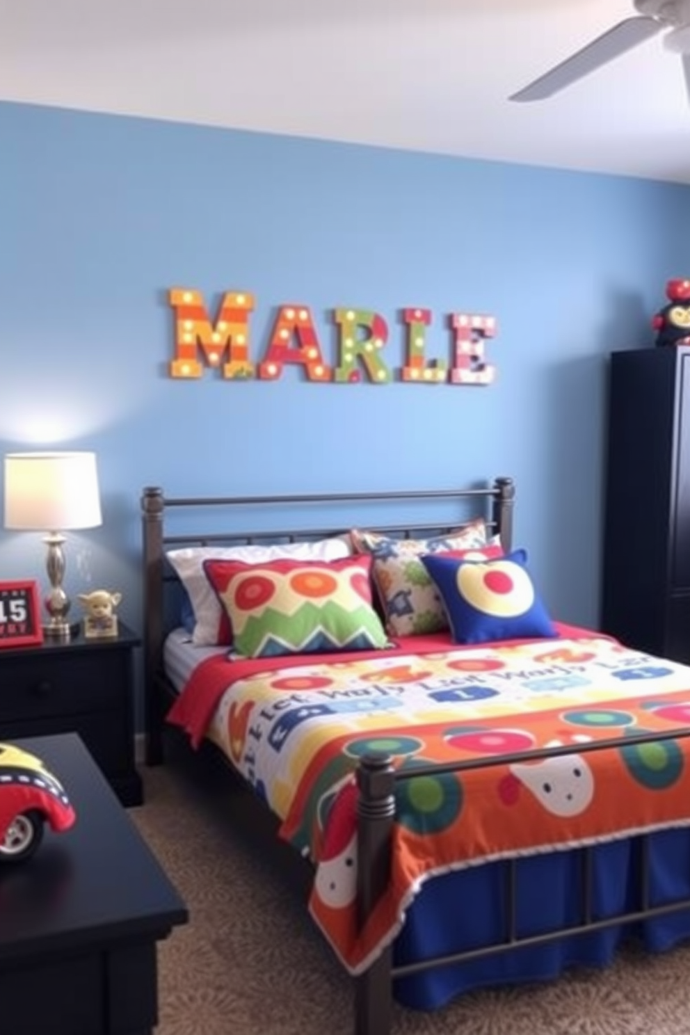 A vibrant boys bedroom featuring personalized name wall art that adds a unique touch to the space. The walls are painted in a light blue color, and the bed is adorned with colorful bedding that complements the artwork.