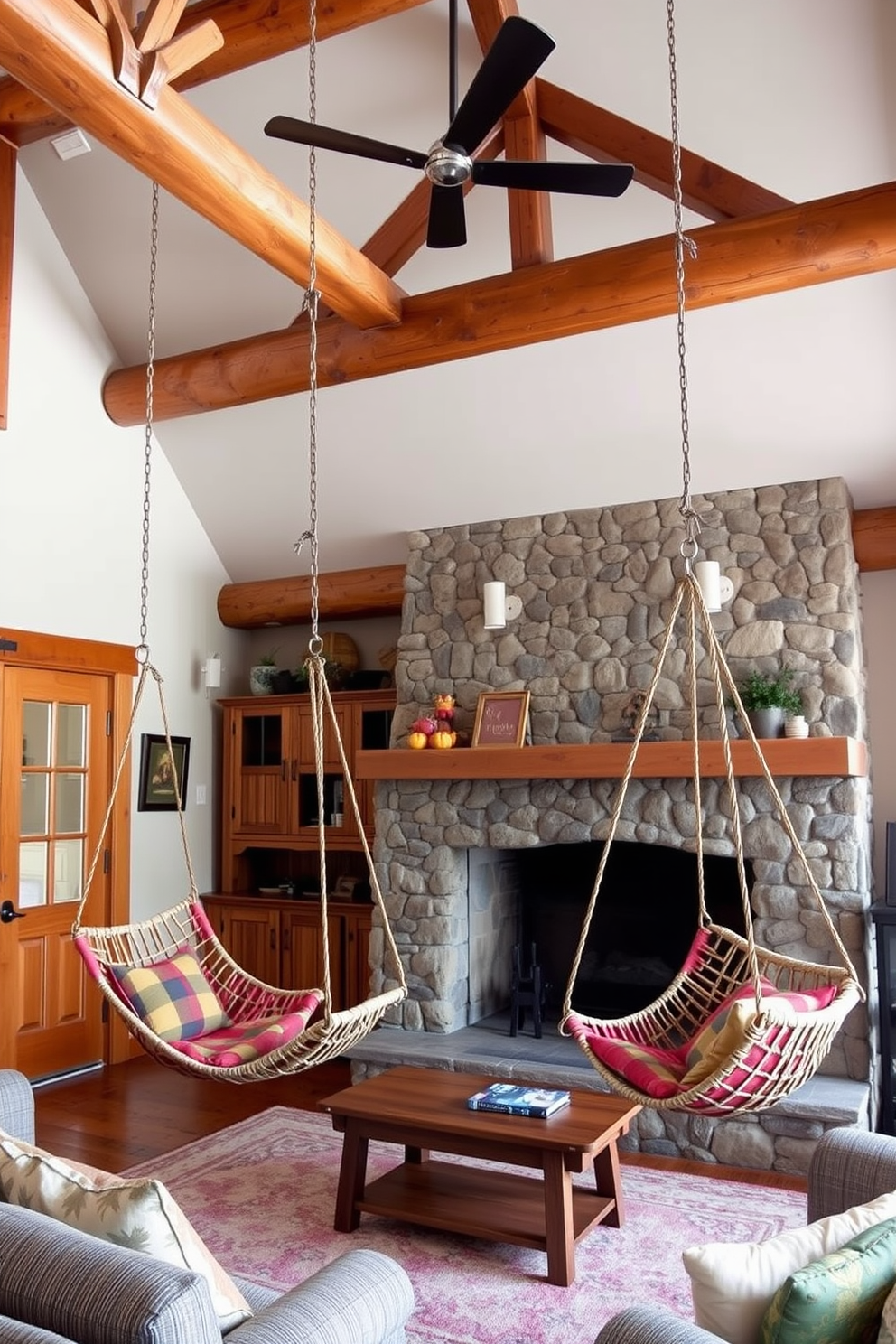 Hanging chairs suspended from the ceiling create a whimsical and playful seating area in the cabin living room. The space features rustic wooden beams and a stone fireplace, enhancing the cozy atmosphere while inviting relaxation and conversation.