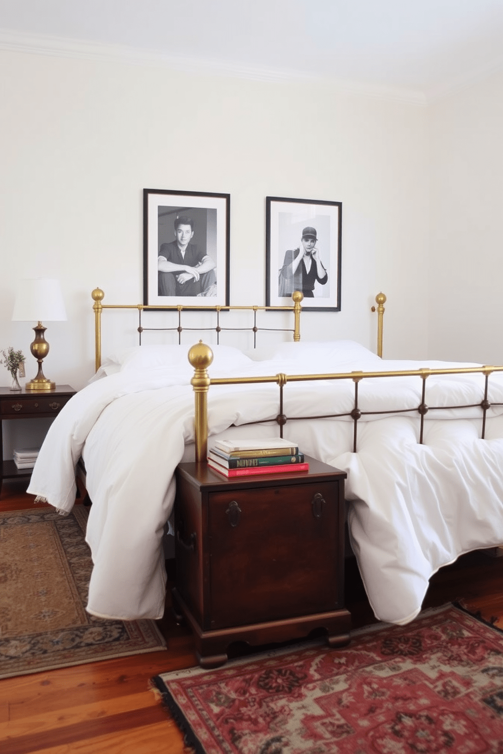 A cozy condo bedroom featuring a vintage brass bed frame adorned with a plush white duvet. An antique wooden chest serves as a bedside table, topped with a retro lamp and a stack of books. The walls are painted in a soft pastel hue, creating a serene atmosphere. A vintage area rug adds warmth to the hardwood floor, while framed black-and-white photographs hang above the bed, adding character and charm.