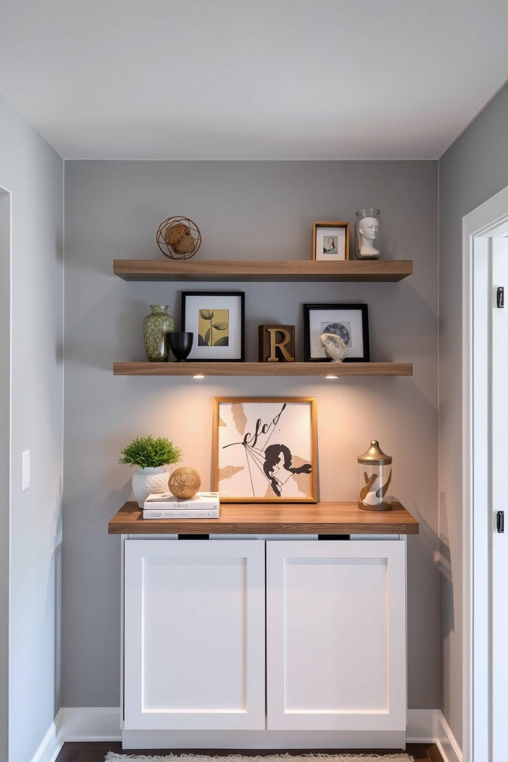 A stylish condo entryway featuring floating shelves adorned with decorative items. The walls are painted in a soft gray hue, creating a welcoming atmosphere.
