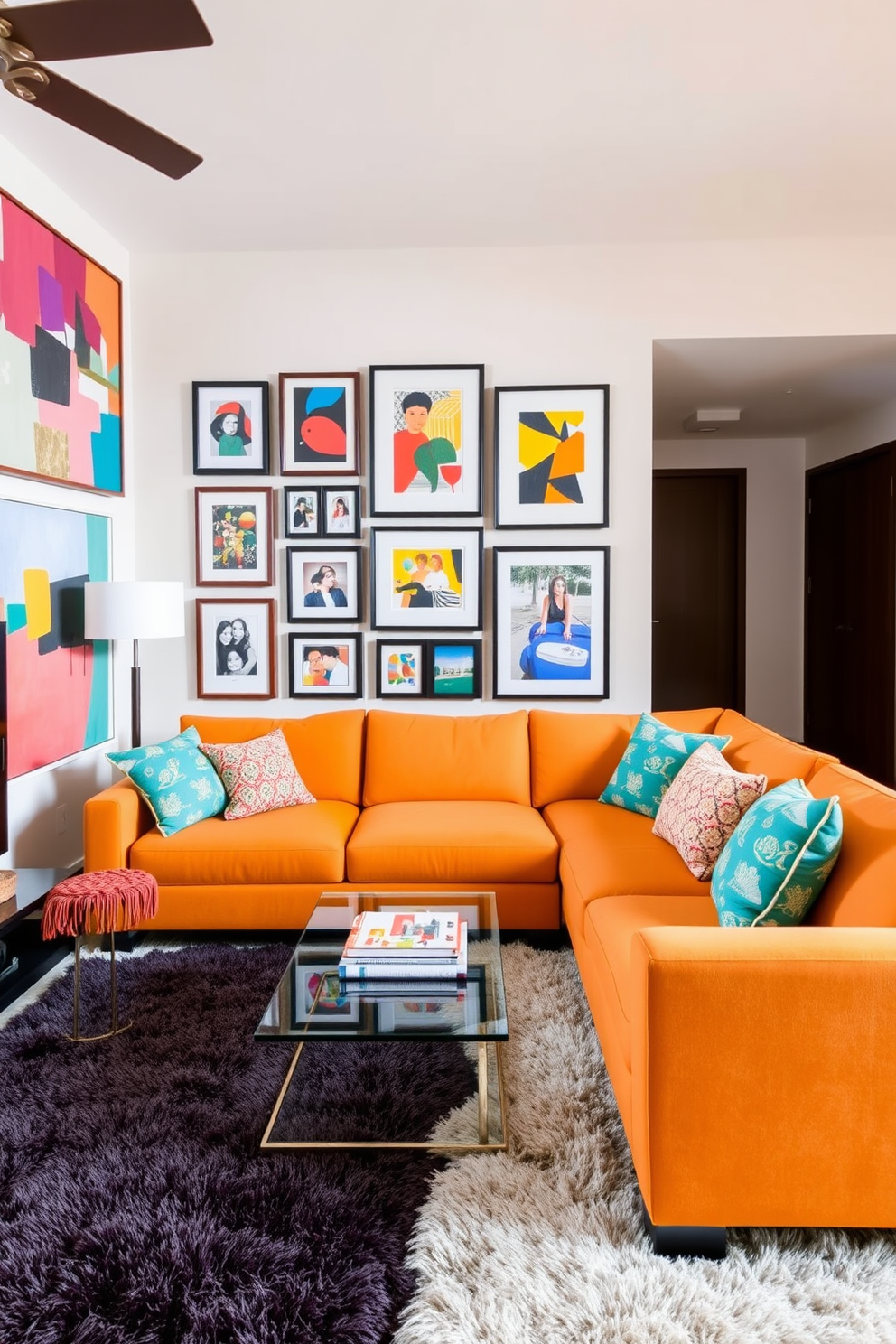 A vibrant condo living room filled with eclectic art pieces that add personality to the space. The walls are adorned with colorful abstract paintings, and a gallery wall features framed photographs and prints in various sizes. The furniture consists of a modern sectional sofa in a bold hue, paired with a sleek glass coffee table. A plush area rug anchors the seating area, while decorative cushions in complementary colors enhance the overall aesthetic.