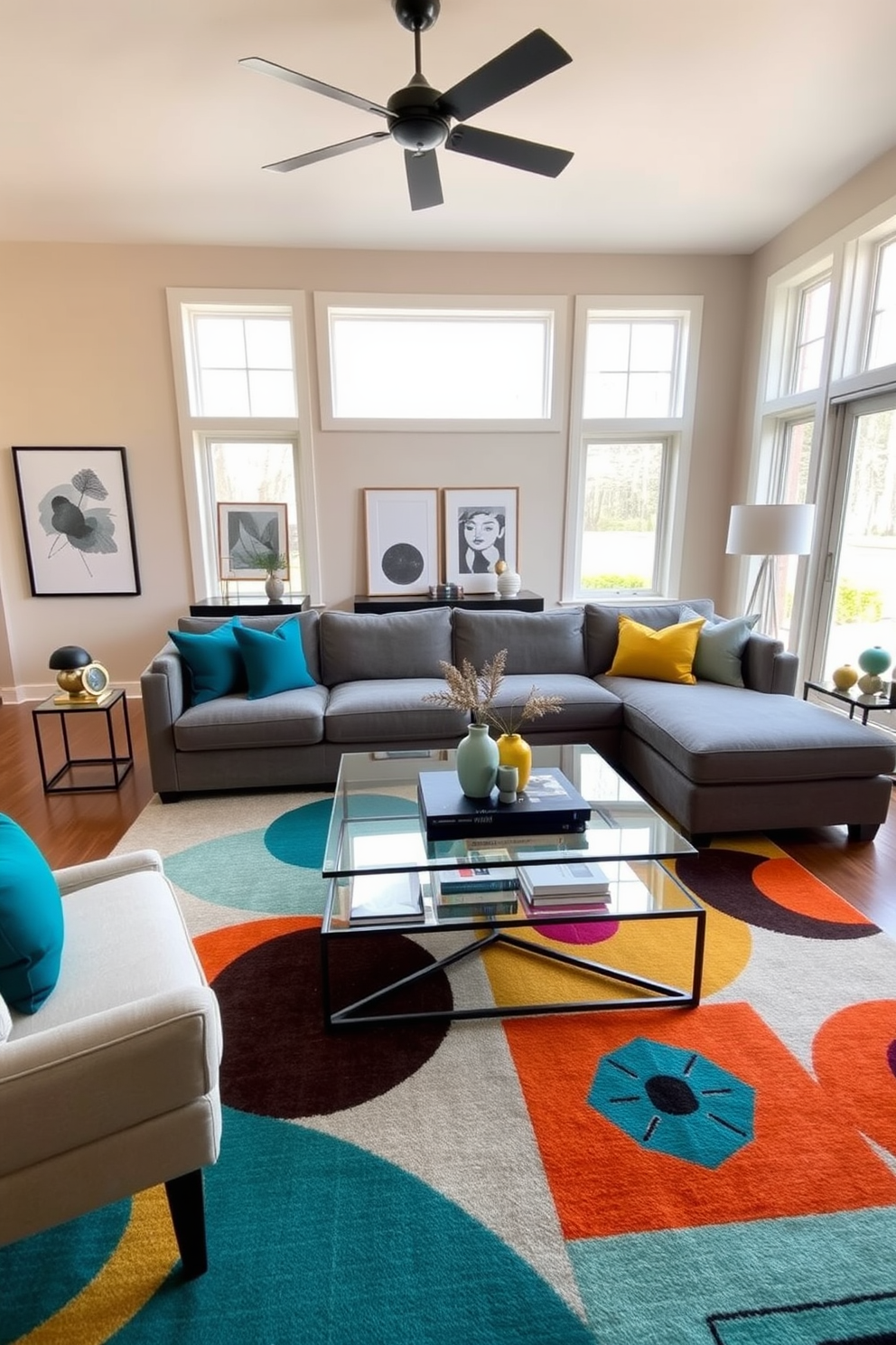 A contemporary family room featuring a neutral color palette with bold accents. The walls are painted in soft beige, complemented by a plush gray sectional sofa adorned with vibrant throw pillows in teal and mustard yellow. A sleek glass coffee table sits in the center, surrounded by a mix of modern art pieces and decorative books. Large windows allow natural light to flood the space, highlighting a striking area rug with geometric patterns in bold colors.