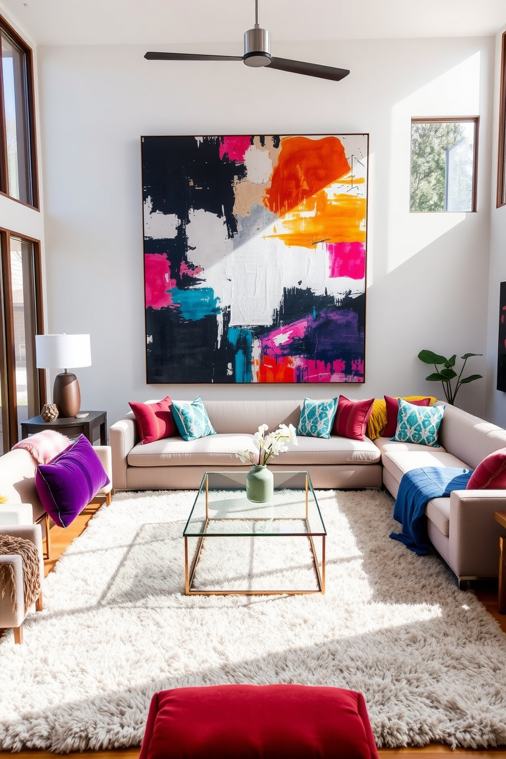 A contemporary family room featuring a large statement artwork as the focal point. The space includes a plush sectional sofa in a neutral tone, complemented by colorful accent pillows that echo the artwork's vibrant hues. Natural light floods the room through oversized windows, enhancing the airy atmosphere. A sleek coffee table sits in the center, surrounded by a cozy area rug that adds warmth and texture to the design.