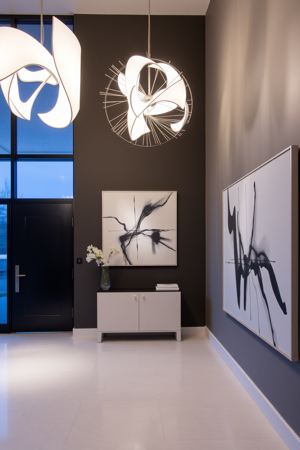 A contemporary foyer features sculptural lighting fixtures that serve as striking focal points. The space is adorned with a sleek console table and a large, abstract artwork that complements the lighting design.