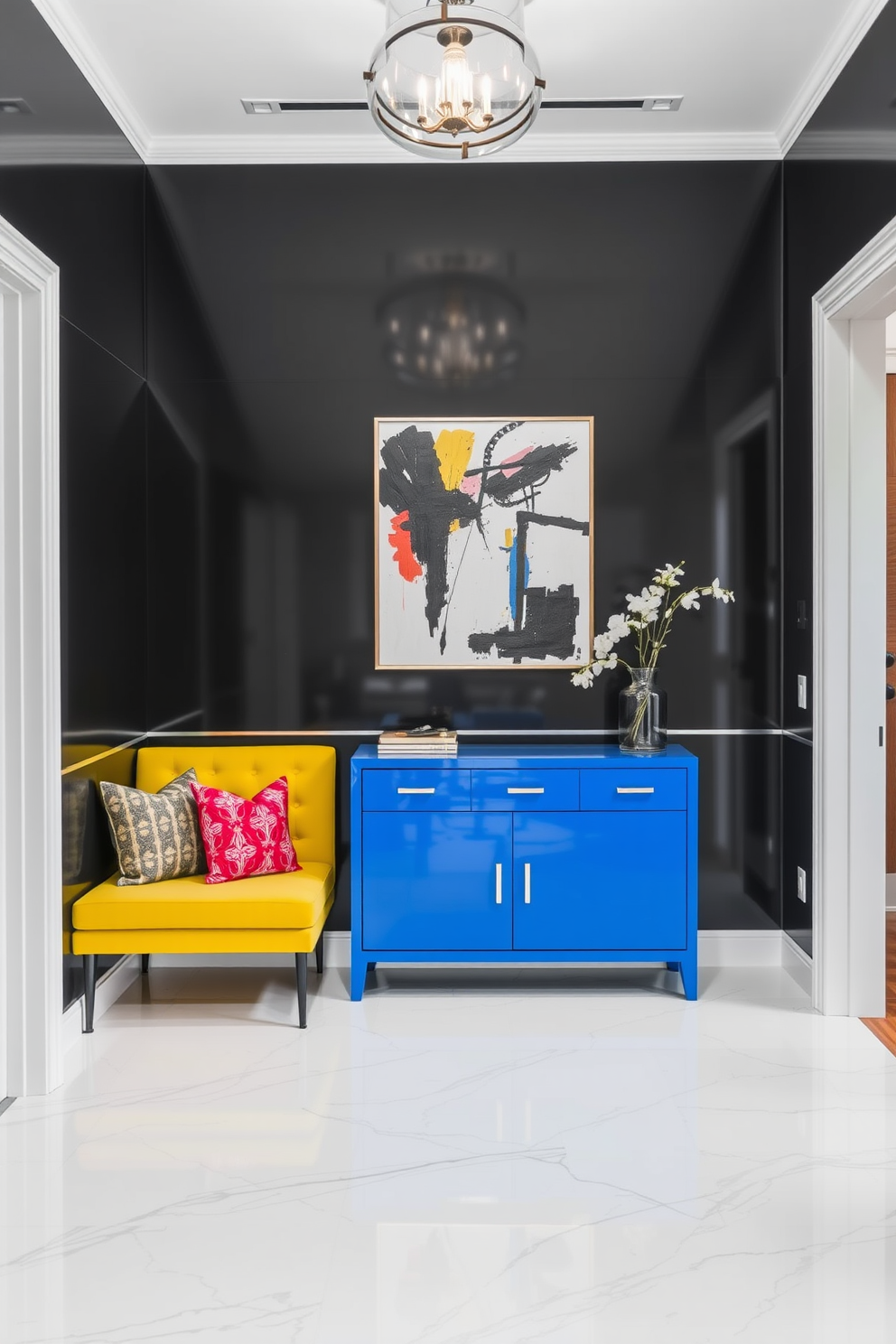 A contemporary foyer featuring a monochrome color scheme with sleek black walls and white accents. A vibrant blue console table stands against the wall, adorned with a striking abstract painting above it. The floor is finished with polished white marble tiles, creating a clean and elegant look. A bold yellow bench is placed near the entrance, complemented by colorful throw pillows for added warmth.