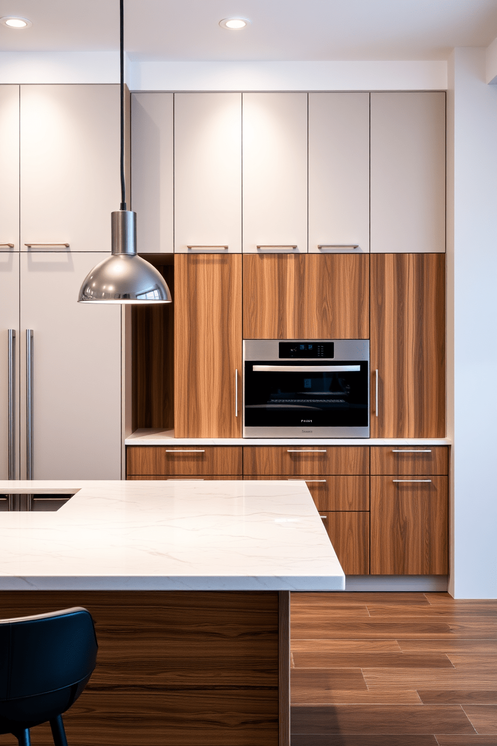 A contemporary kitchen design featuring sleek cabinetry with wood accents that add warmth to the space. The kitchen island is topped with a polished stone surface, complemented by stylish pendant lighting overhead.