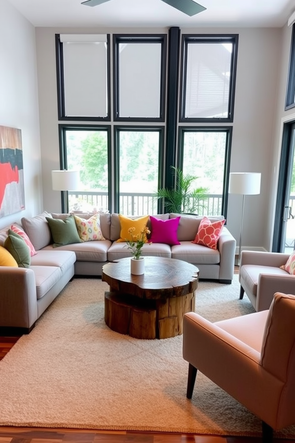 A cozy contemporary living room features a plush sectional sofa in soft gray upholstery, accented by vibrant throw pillows in various colors. A round coffee table made of reclaimed wood sits at the center, surrounded by a pair of stylish armchairs that invite conversation. The walls are adorned with abstract art pieces that add a pop of color, while large windows allow natural light to flood the space. A soft area rug anchors the seating area, creating a warm and inviting atmosphere perfect for socializing with friends and family.