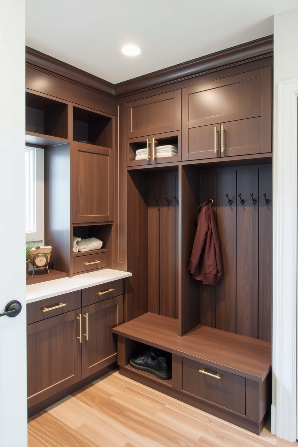 Custom cabinetry designed for a tailored fit creates a seamless integration with the mudroom space. The cabinetry features sleek lines and a mix of open shelving and closed storage to keep the area organized and stylish. Incorporate a combination of durable materials and a neutral color palette to enhance the contemporary feel. Add functional elements like hooks and benches to create a welcoming and practical mudroom environment.