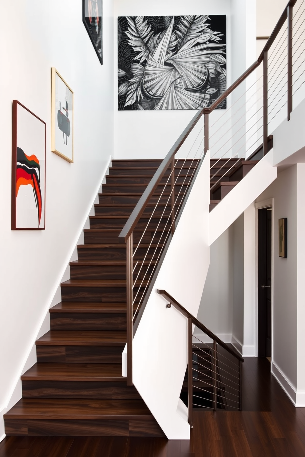 A bold geometric staircase features sharp angles and striking contrasts in color. The staircase is crafted from a combination of dark wood and bright white finishes, creating a visually dynamic focal point in the space. Surrounding the staircase, the walls are adorned with minimalist artwork that complements the modern aesthetic. Sleek metal railings enhance the contemporary feel while ensuring safety and style.