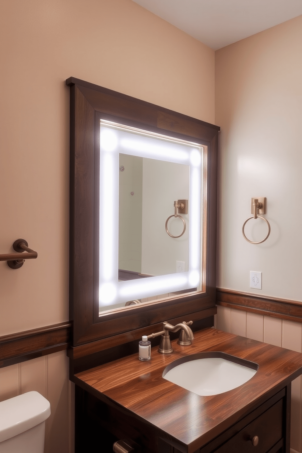 A Craftsman bathroom featuring integrated lighting within the mirror design. The wooden vanity is complemented by warm brass fixtures and a large mirror that illuminates the space with soft, ambient light.