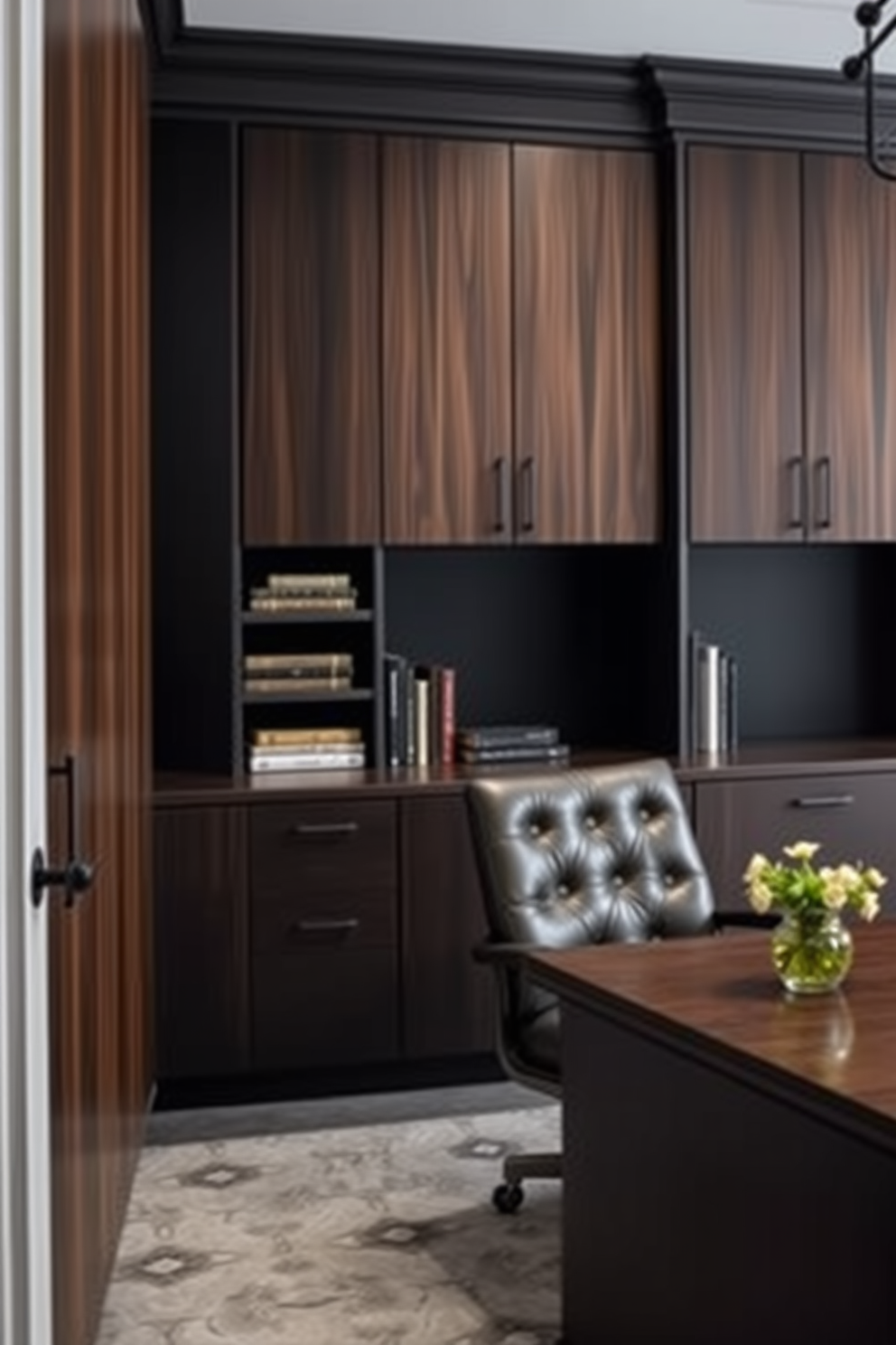 Functional storage solutions in dark finishes. The room features sleek cabinets with a rich walnut veneer, providing ample space for books and office supplies. Dark study room design ideas. The walls are painted in a deep charcoal color, complemented by a large wooden desk and a comfortable leather chair.