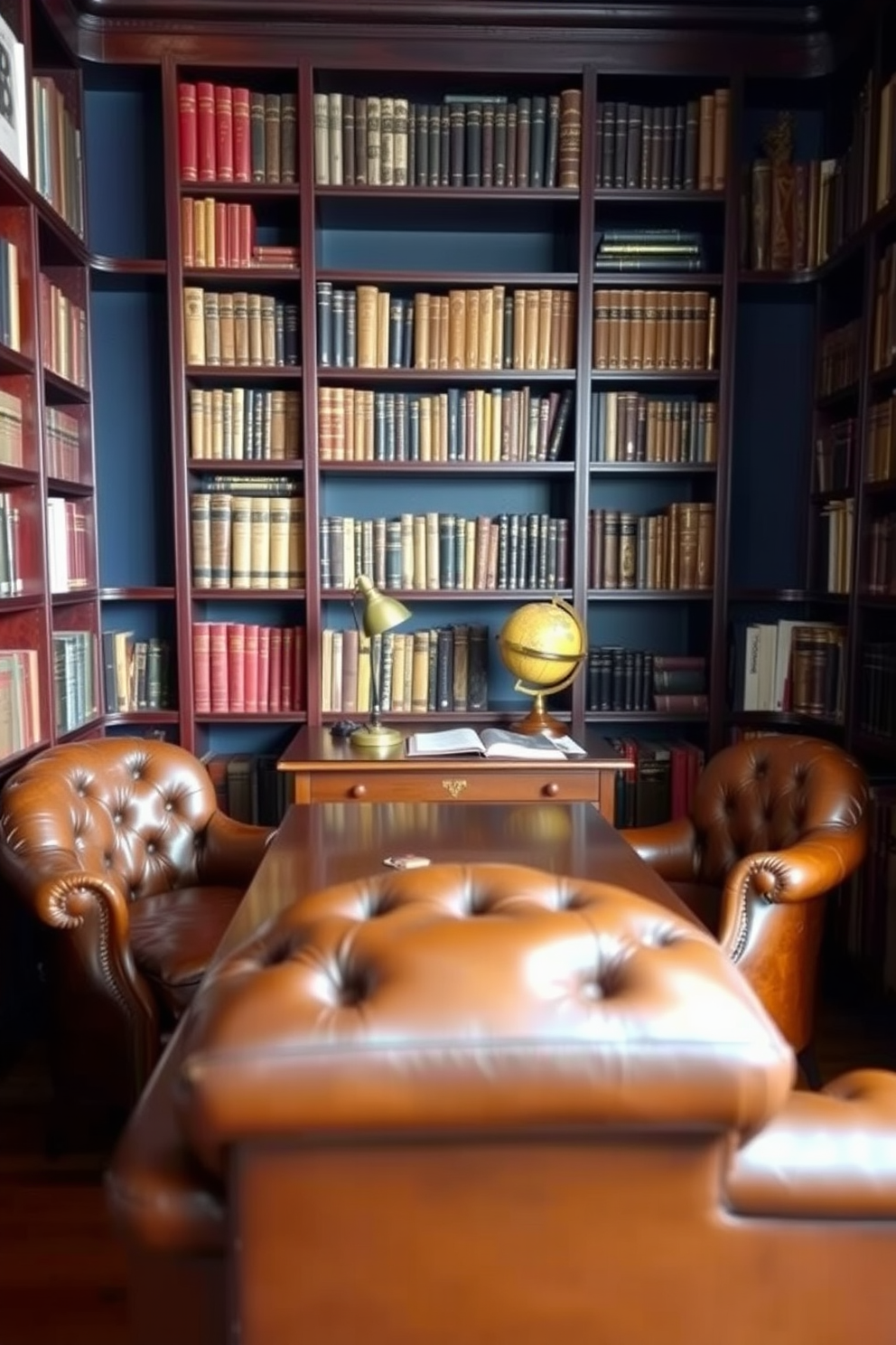 Vintage leather chairs exude sophistication and charm in a dark study room. The rich brown tones of the leather contrast beautifully with deep mahogany shelves filled with classic literature. A large wooden desk sits in the center, adorned with a brass desk lamp and a vintage globe. The walls are painted in a deep navy, creating an intimate and focused atmosphere perfect for reading or working.