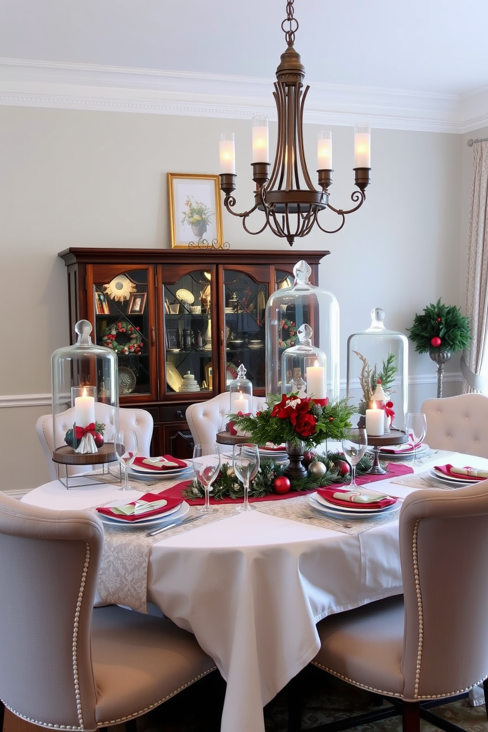 A beautifully arranged dining room featuring glass cloches showcasing seasonal decor items. The table is elegantly set with a festive tablecloth and surrounded by upholstered chairs, creating a warm and inviting atmosphere.