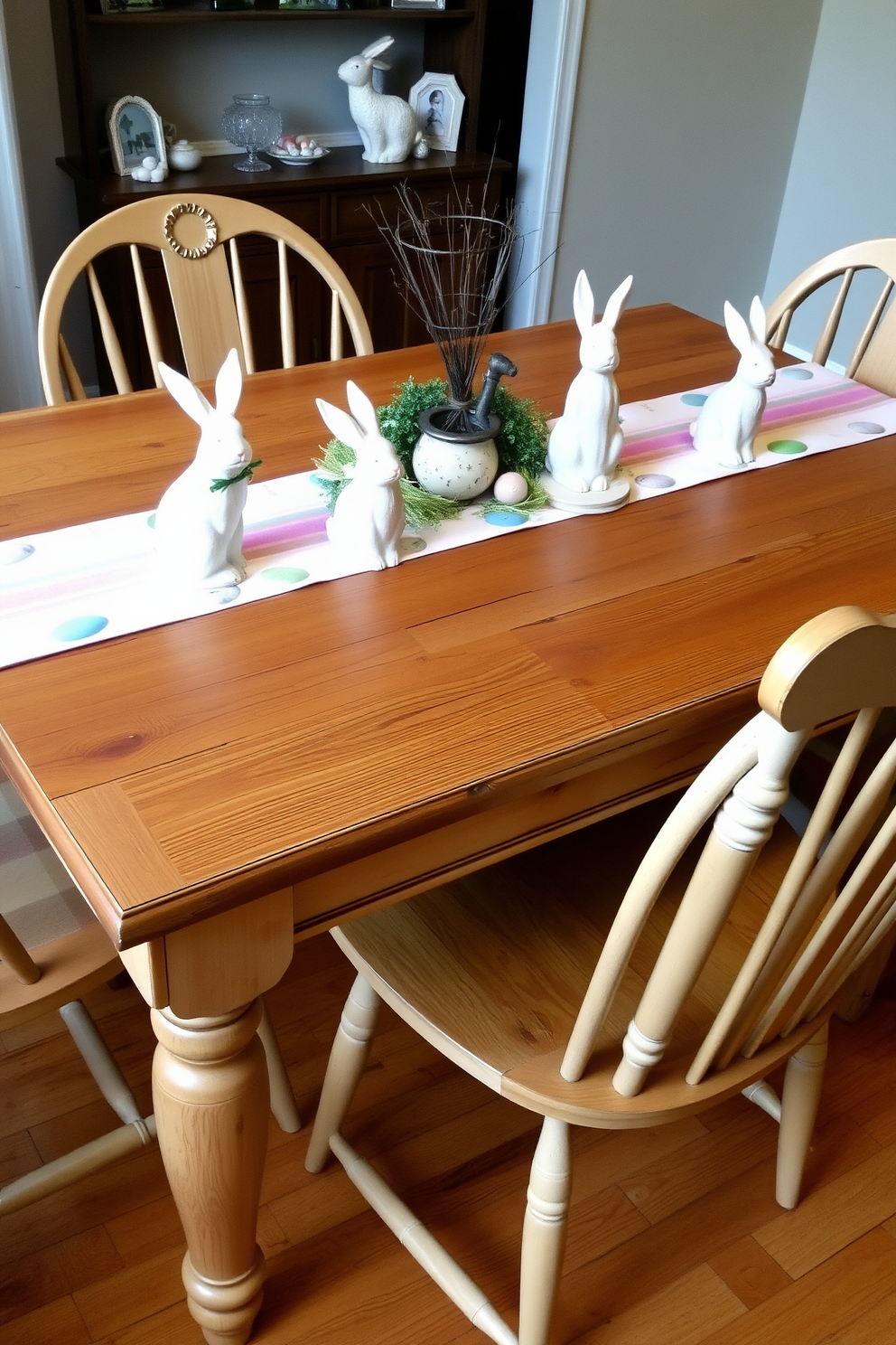 A rustic wooden table is adorned with charming bunny accents, creating a warm and inviting atmosphere for Easter celebrations. Surrounding the table are mismatched chairs that add character, while a pastel-colored table runner complements the seasonal decor.