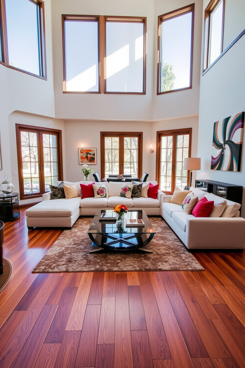 A luxurious living room featuring warm wood flooring that exudes timeless appeal. The space is adorned with a plush cream sofa, accented by colorful throw pillows and a sleek glass coffee table. Large windows allow natural light to flood the room, highlighting the rich tones of the wooden floor. A stylish area rug anchors the seating arrangement, while modern art pieces adorn the walls, adding character to the elegant atmosphere.