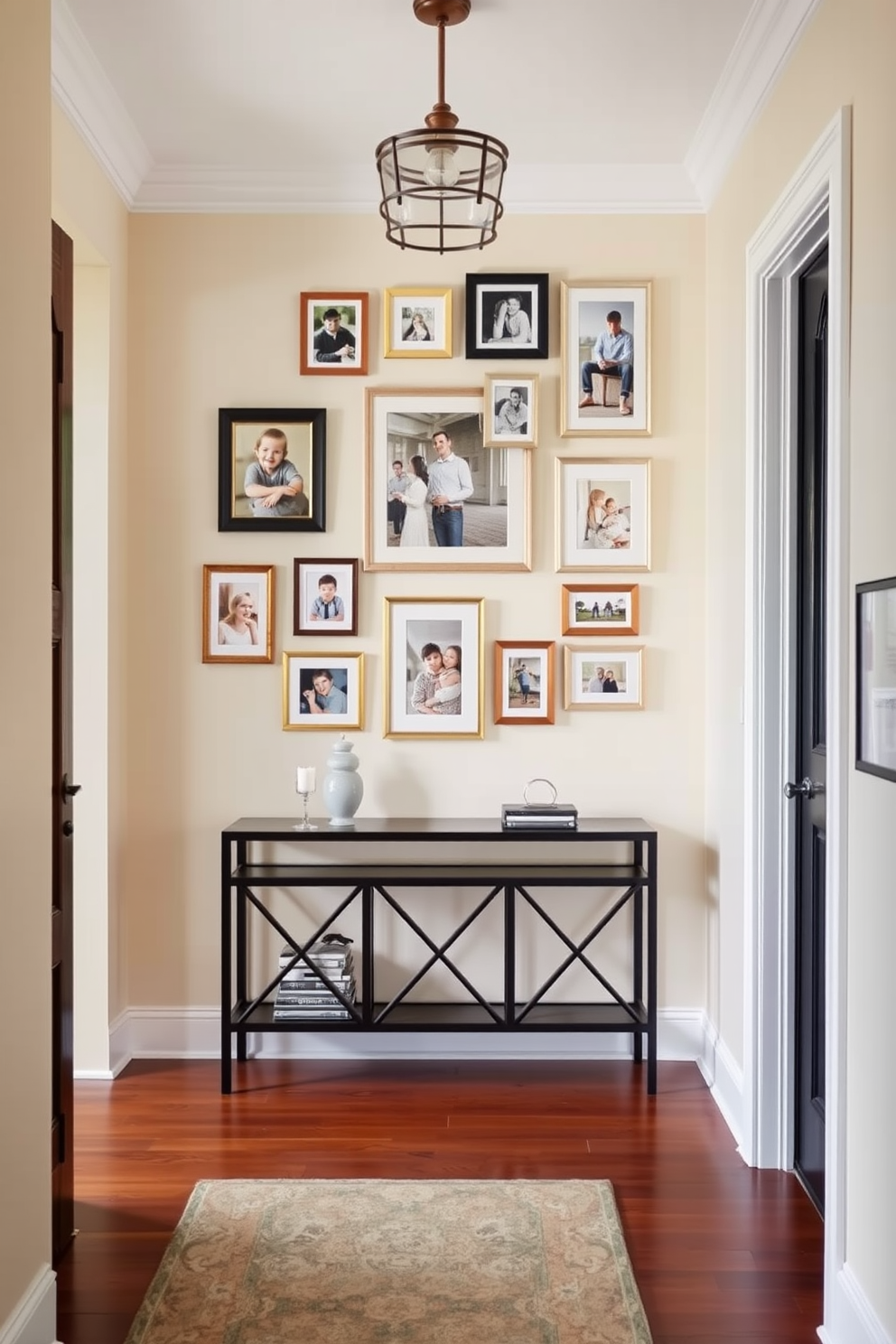 A stunning entrance foyer featuring a gallery wall adorned with framed family photos in various sizes. The wall is painted in a soft cream color, complementing the rich wooden flooring and a stylish console table beneath the photos.