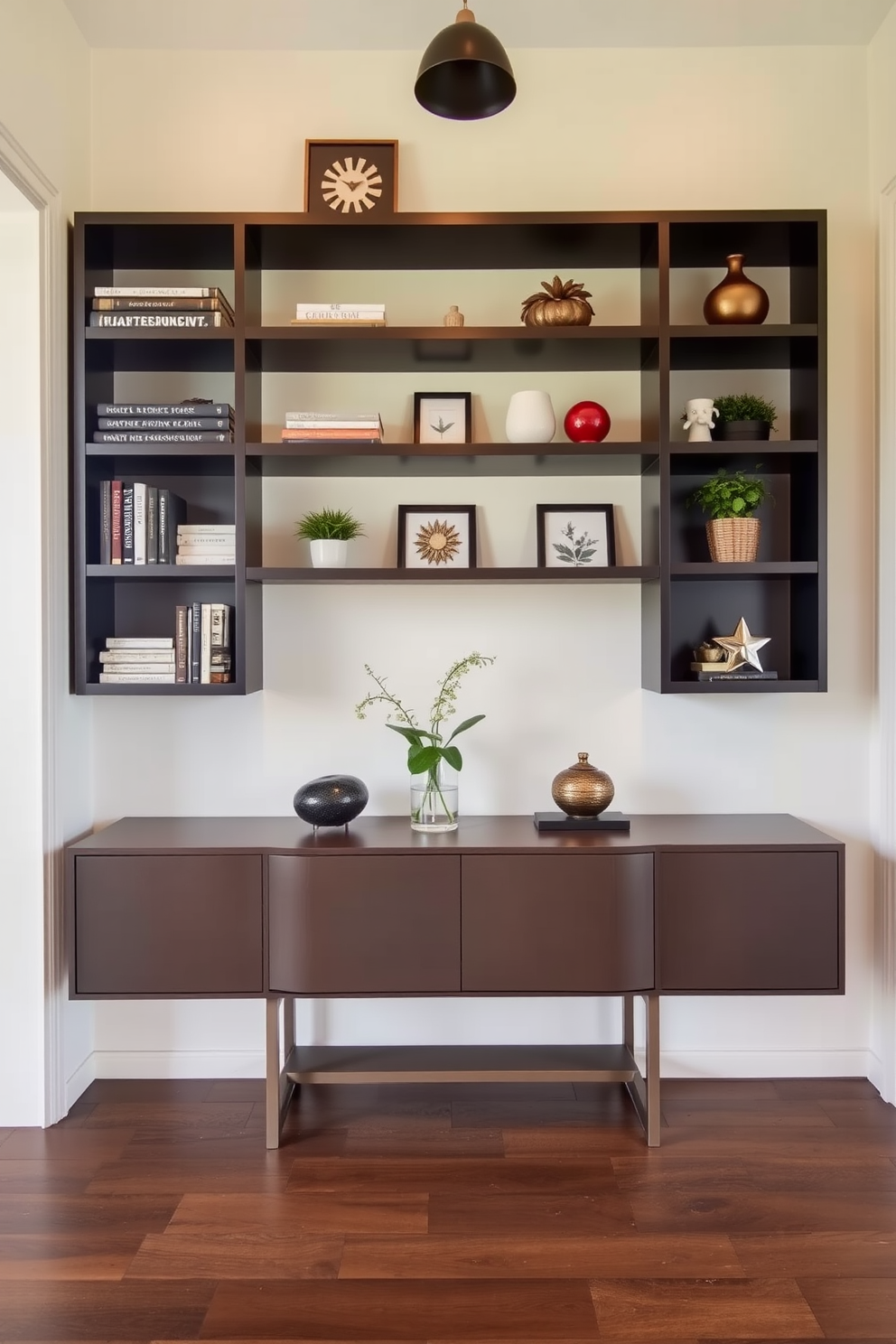 A stylish entryway featuring open shelving adorned with decorative items such as books, plants, and art pieces. The walls are painted in a soft pastel hue, and a sleek console table is positioned beneath the shelves, enhancing the welcoming atmosphere.