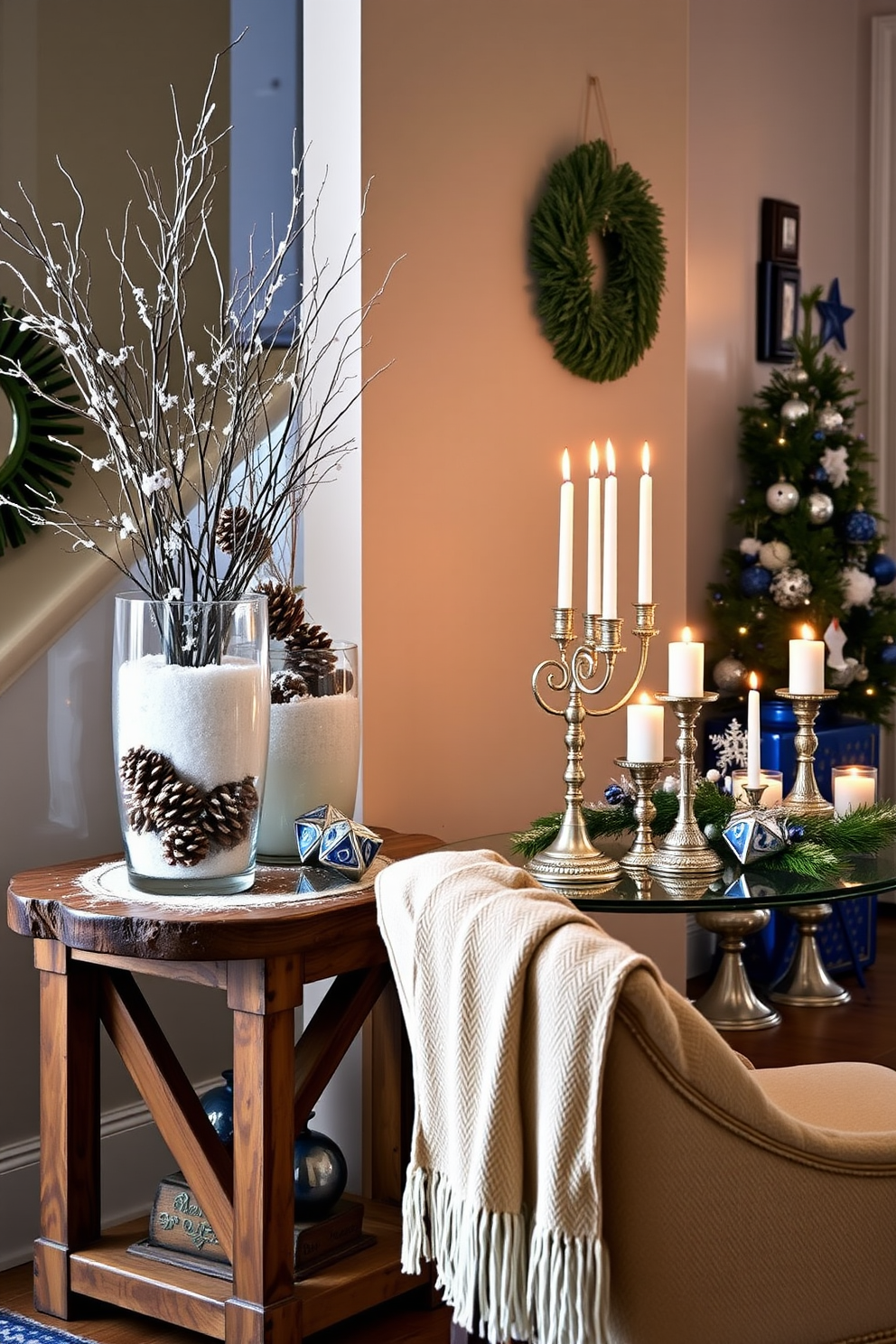 A cozy entryway adorned with vases filled with pinecones and snow, creating a winter wonderland effect. The vases are placed on a rustic wooden console table, complemented by a warm throw blanket draped over a nearby chair. Festive Hanukkah decorations are displayed throughout the space, featuring blue and silver accents. A beautifully lit menorah sits on the table, surrounded by decorative dreidels and elegant candles.