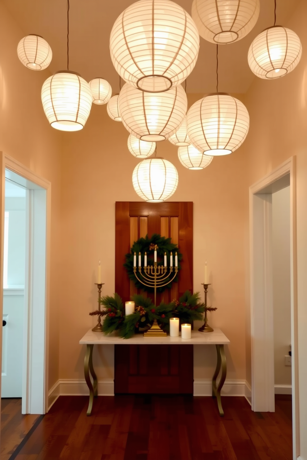 A warm and inviting entryway adorned with hanging paper lanterns of varying sizes. The soft glow from the lanterns casts a gentle light, creating a festive atmosphere perfect for Hanukkah celebrations. The walls are painted in a soft cream color, complementing the rich wooden flooring. On a console table, a decorative menorah is elegantly displayed alongside seasonal greenery and candles.