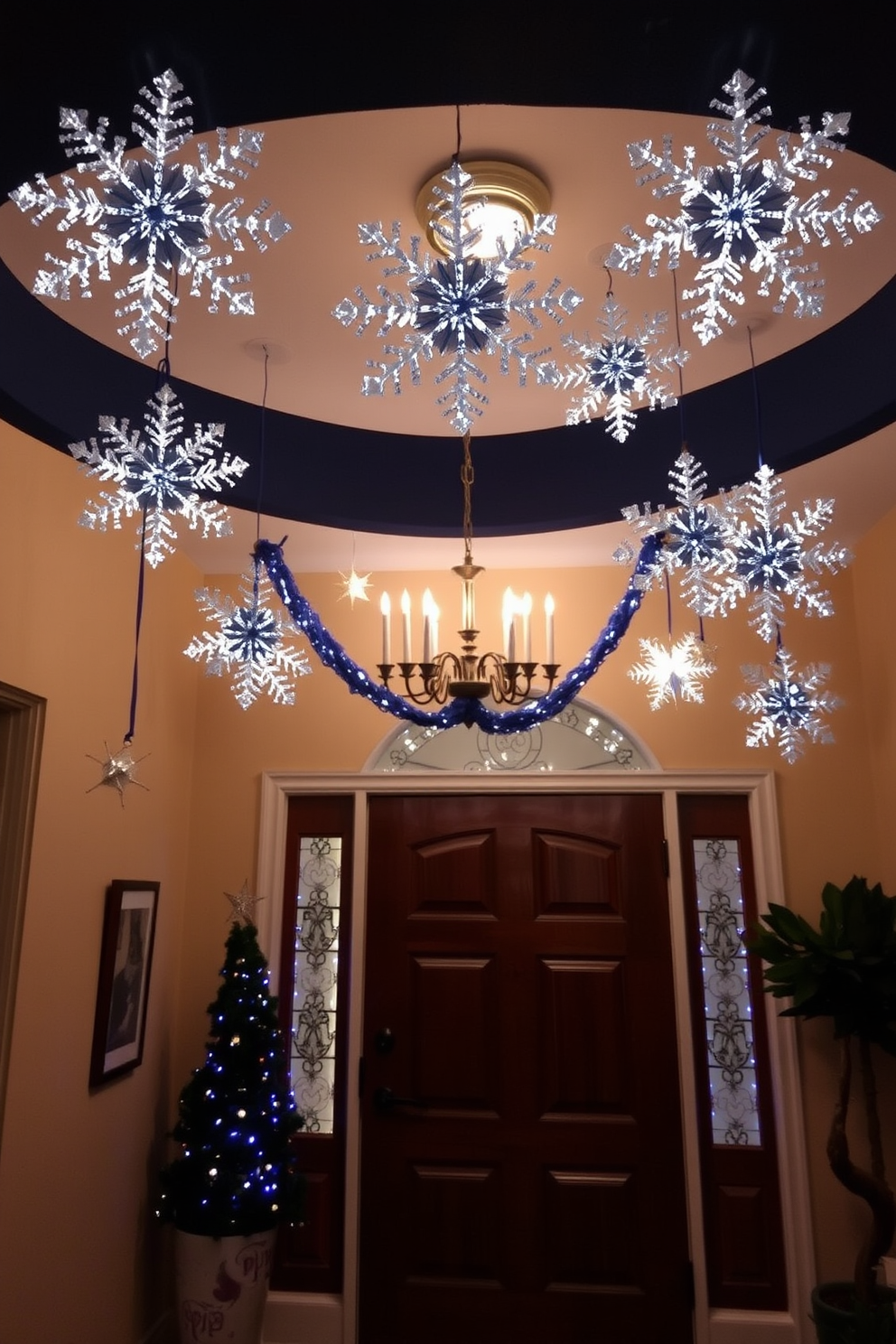 A beautifully decorated entryway for Hanukkah. Glittery snowflakes hang from the ceiling, creating a festive atmosphere that welcomes guests.