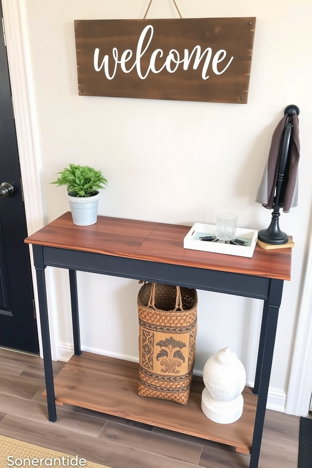 A charming entryway table adorned with a personalized welcome sign. The table features a rustic wooden surface and is complemented by a small potted plant and a decorative tray for keys.