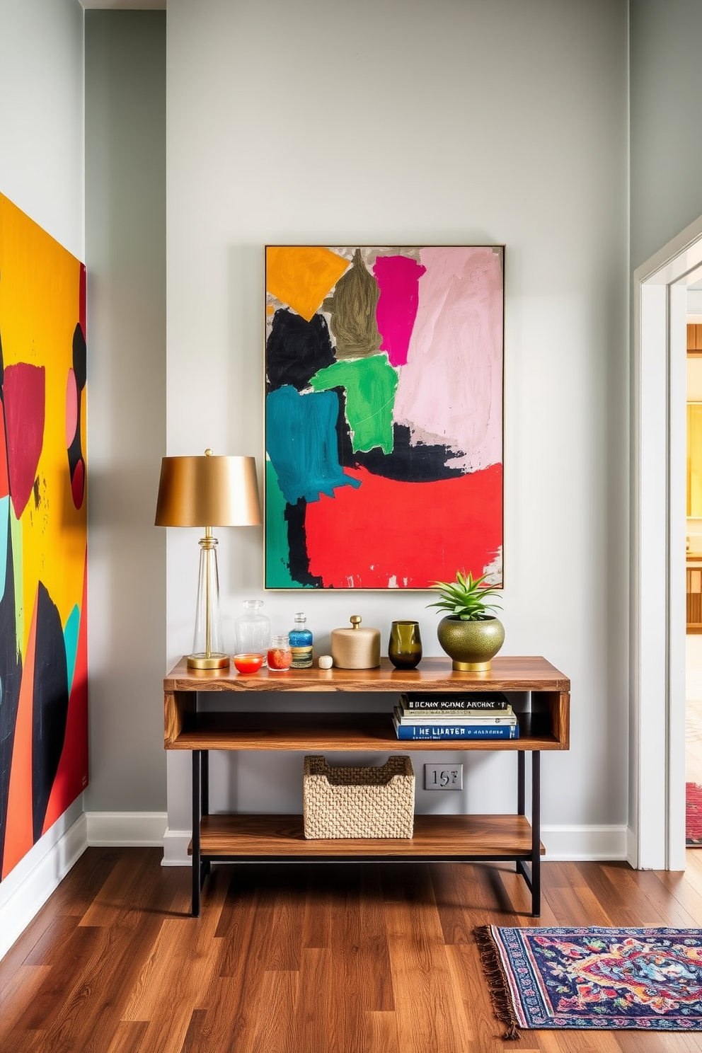 A vibrant entryway filled with colorful artwork that enhances the overall aesthetic. The walls are adorned with large, abstract paintings in bold hues, creating a lively atmosphere. In the center, a sleek entryway table made of reclaimed wood showcases a mix of decorative items. A stylish lamp and a small potted plant add warmth and personality to the space.