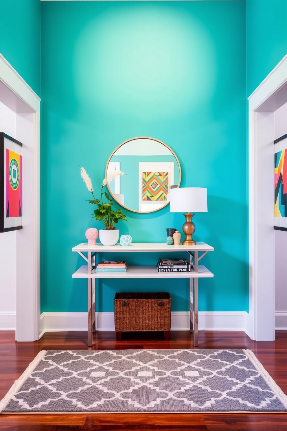 A vibrant entryway features a colorful accent wall painted in a bold turquoise hue. Complementing the wall, a sleek console table sits below a round mirror, adorned with decorative items and a potted plant. The floor is covered with a stylish geometric rug that adds warmth to the space. Flanking the entryway, framed artwork in bright colors enhances the overall design, creating an inviting atmosphere.