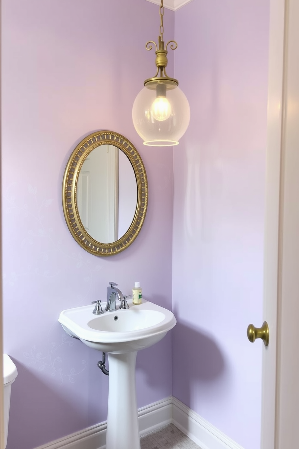 A serene powder room featuring soft pastel colors that create a calming ambiance. The walls are painted in a light lavender hue, complemented by a delicate floral wallpaper on one accent wall. A sleek pedestal sink with a polished chrome faucet sits against the wall. Above the sink, a vintage-style round mirror with a subtle gold trim reflects the soft lighting from an elegant chandelier.