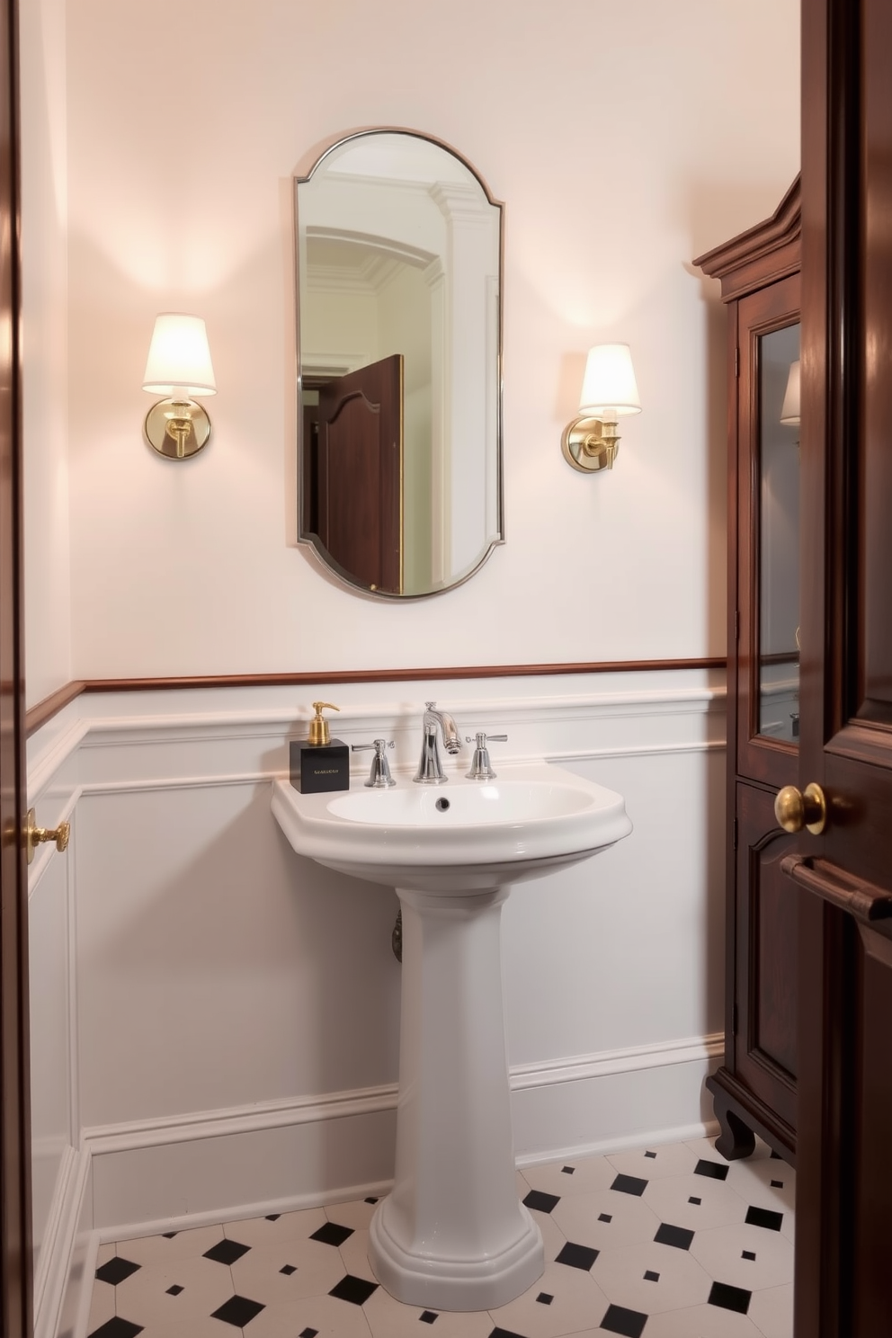 A stylish pedestal sink with a sleek modern faucet serves as the centerpiece of the European powder room. Elegant wall sconces flank the mirror above the sink, casting a warm glow on the soft pastel-colored walls. Rich wooden accents and a vintage-inspired cabinet add a touch of charm to the space. The floor is adorned with classic black and white tiles, creating a timeless and sophisticated atmosphere.