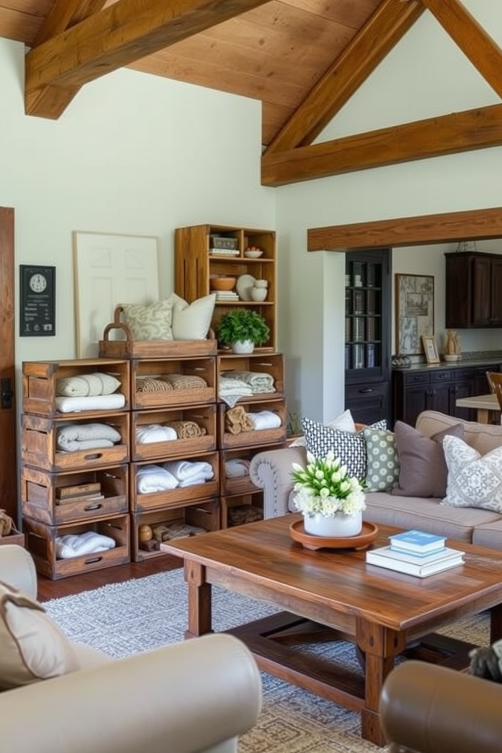 A cozy farmhouse living room features vintage wooden crates used as stylish storage solutions. The crates are stacked in a corner, filled with soft blankets and decorative pillows, adding both functionality and charm to the space. The room is adorned with rustic elements such as exposed wooden beams and a large farmhouse-style coffee table. Plush seating in neutral tones complements the warm, inviting atmosphere created by the vintage crates.