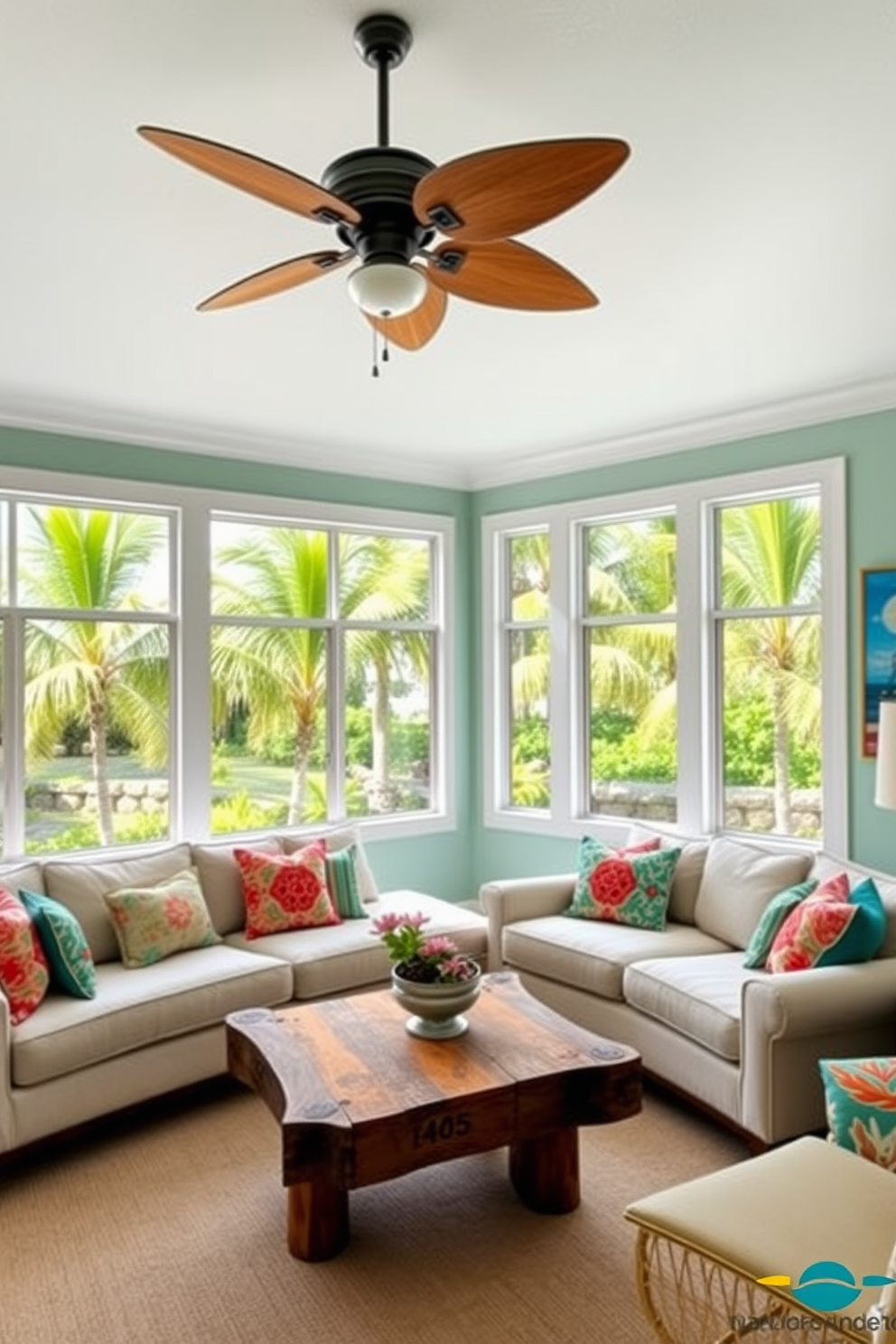 A bright and airy Florida living room features large windows that invite natural light and showcase a view of lush palm trees. The room is anchored by a comfortable sectional sofa in light fabric, complemented by vibrant throw pillows that reflect the tropical theme. In the center of the room, a stylish coffee table made of reclaimed wood adds warmth and character. A ceiling fan with wooden blades hangs elegantly above, providing a refreshing breeze that enhances the relaxed atmosphere. The walls are painted in a soft seafoam green, creating a serene backdrop for the space. Accents of coral and turquoise are incorporated through artwork and decorative accessories, evoking the colors of the ocean.